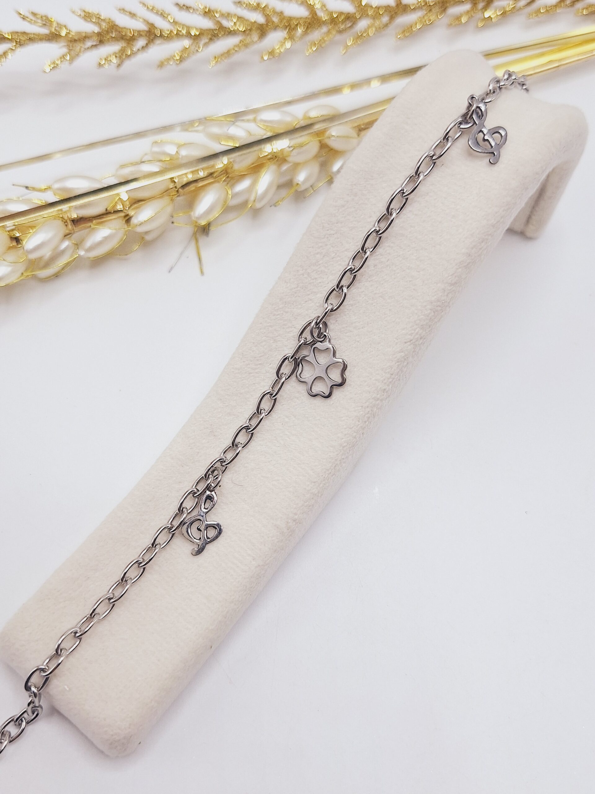 دستبند زنجیری طرح گل قلبی و موزیک استیل