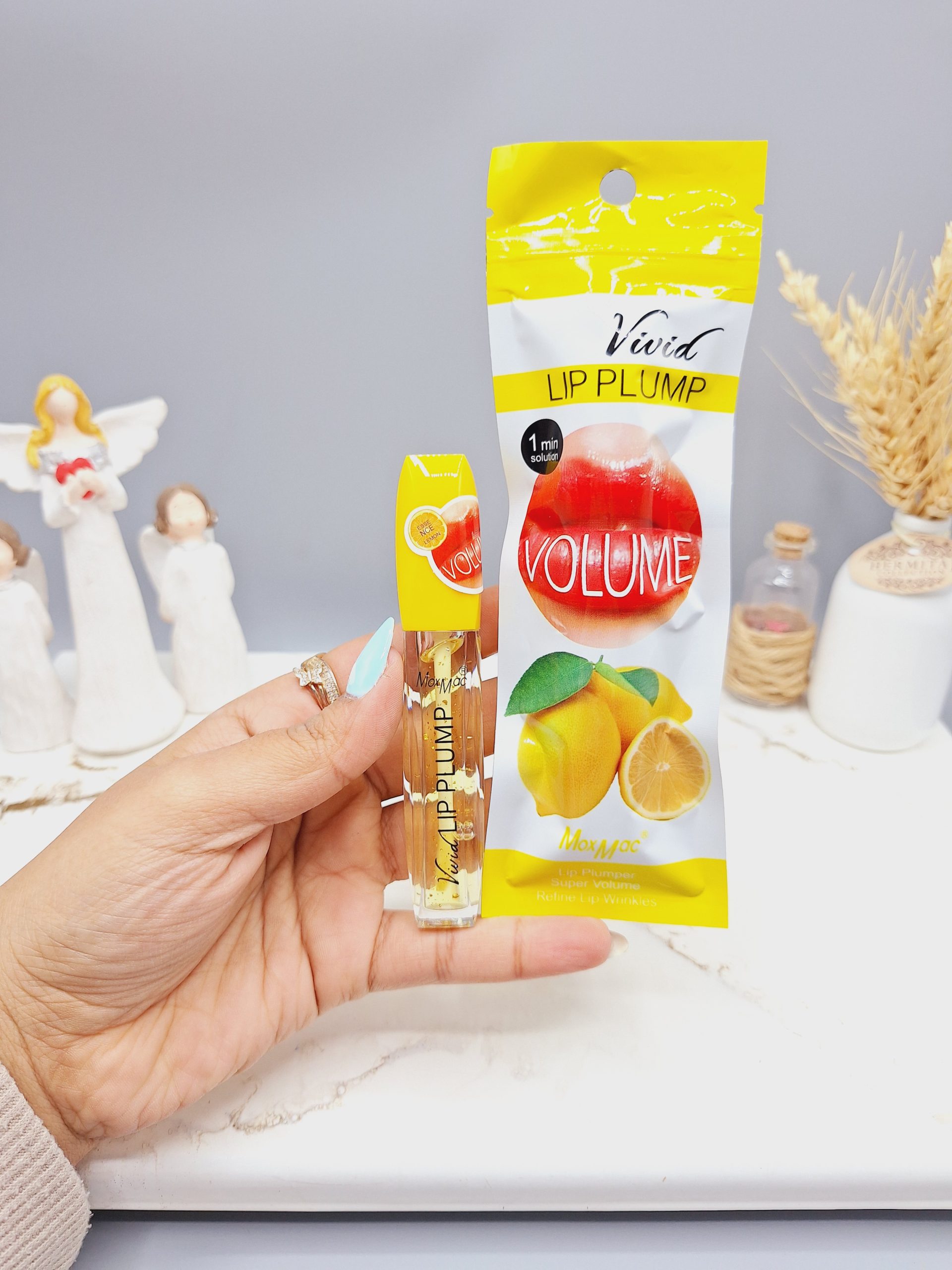 حجم دهنده لب رایحه لیمو Vivid کد 1551