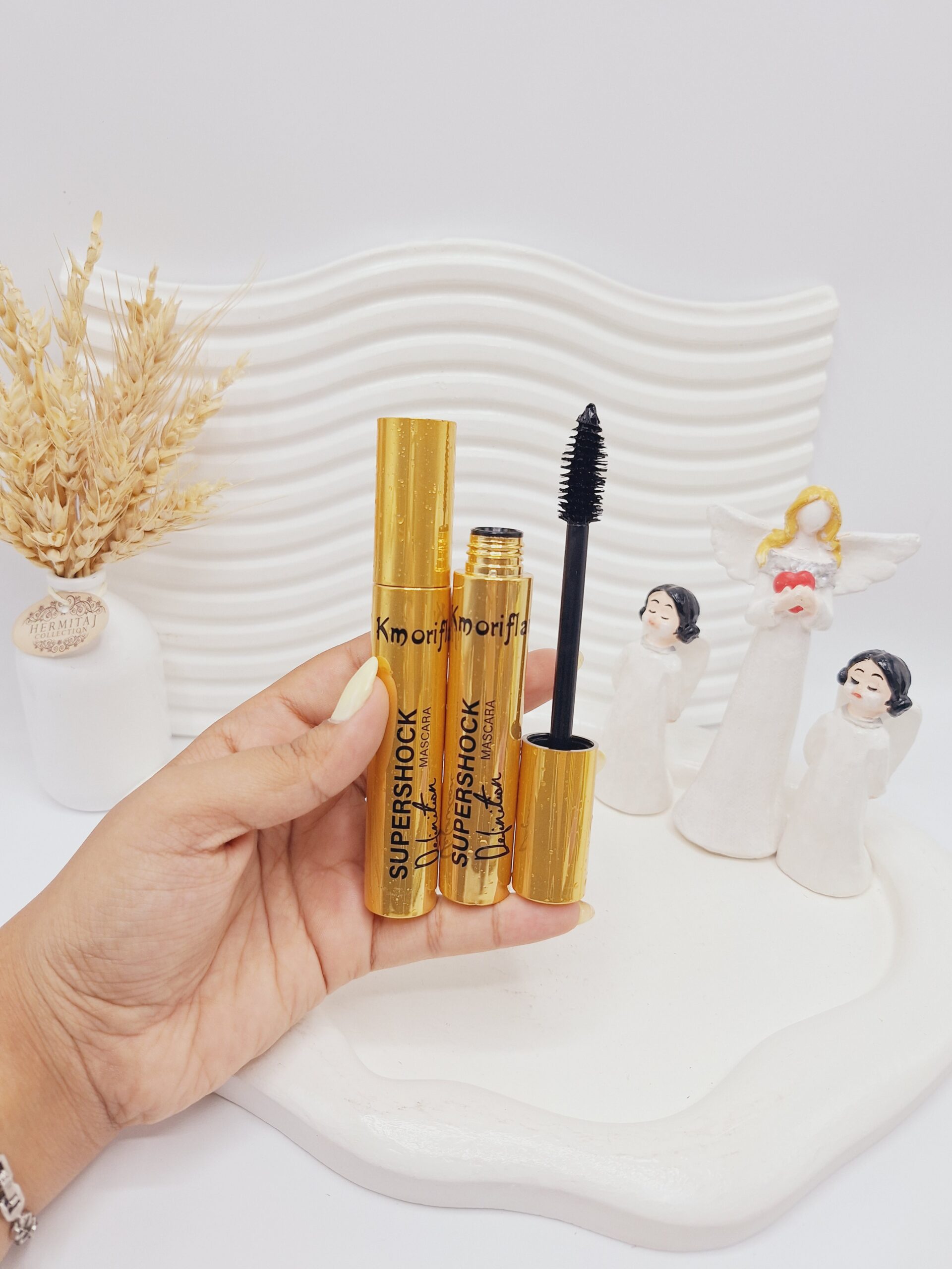 ریمل سوپر شوک پرپشت کننده و حجم دهنده مژه پوکه طلایی کد 0259