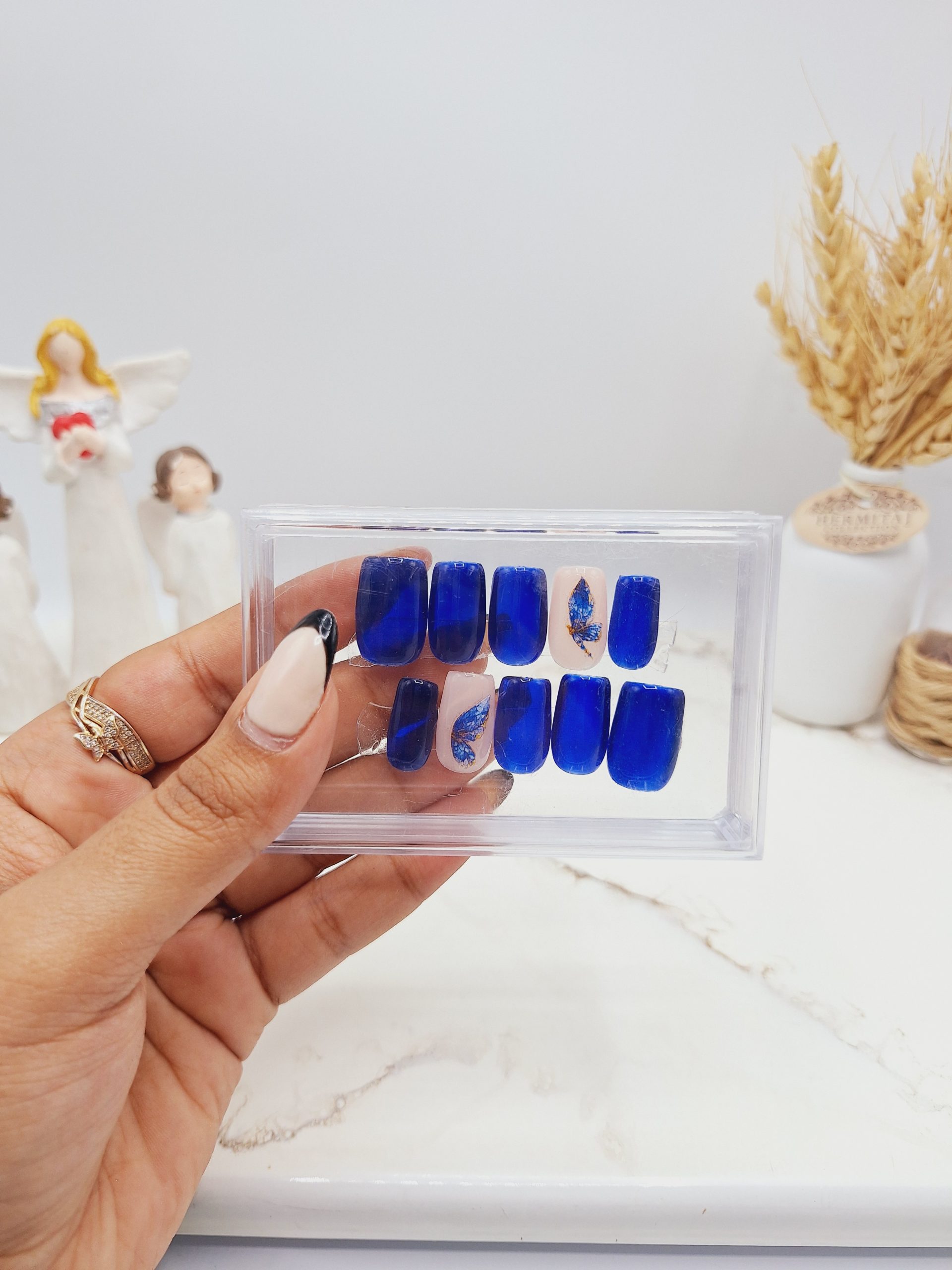 ناخن مصنوعی با مواد کاشت مدل پروانه رنگ سورمه ای (به همراه پک اختصاصی)