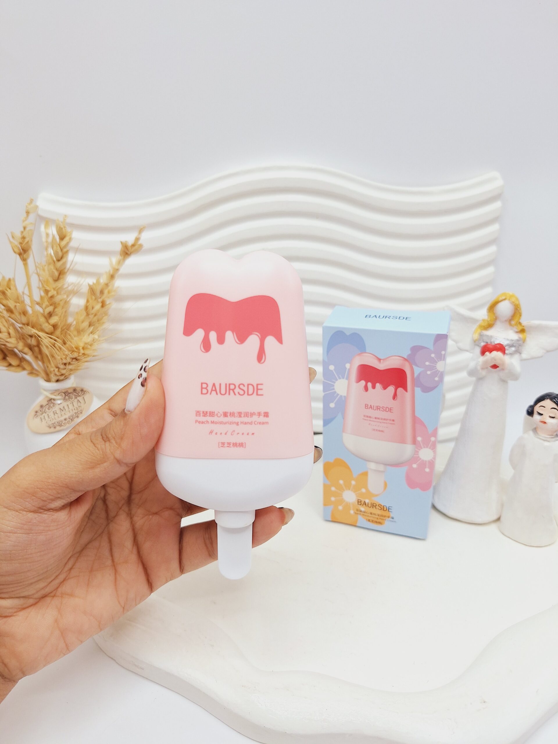 کرم دست مرطوب کننده و آبرسان طرح بستنی چوبی رنگ صورتی BAURSDE کد 7280