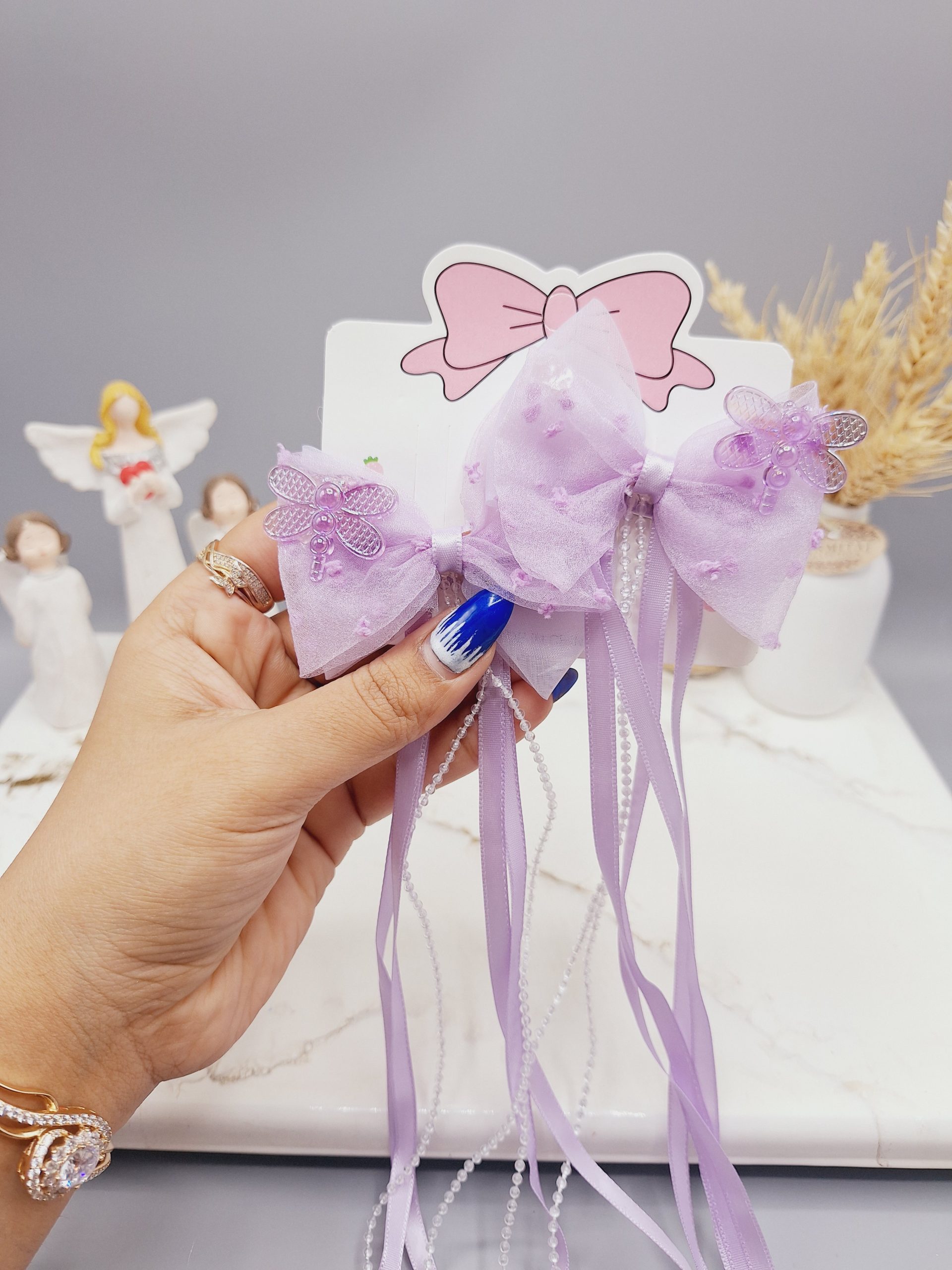 ست 2 تایی گیره مو پاپیونی همراه با آویز نواری و نگین دار