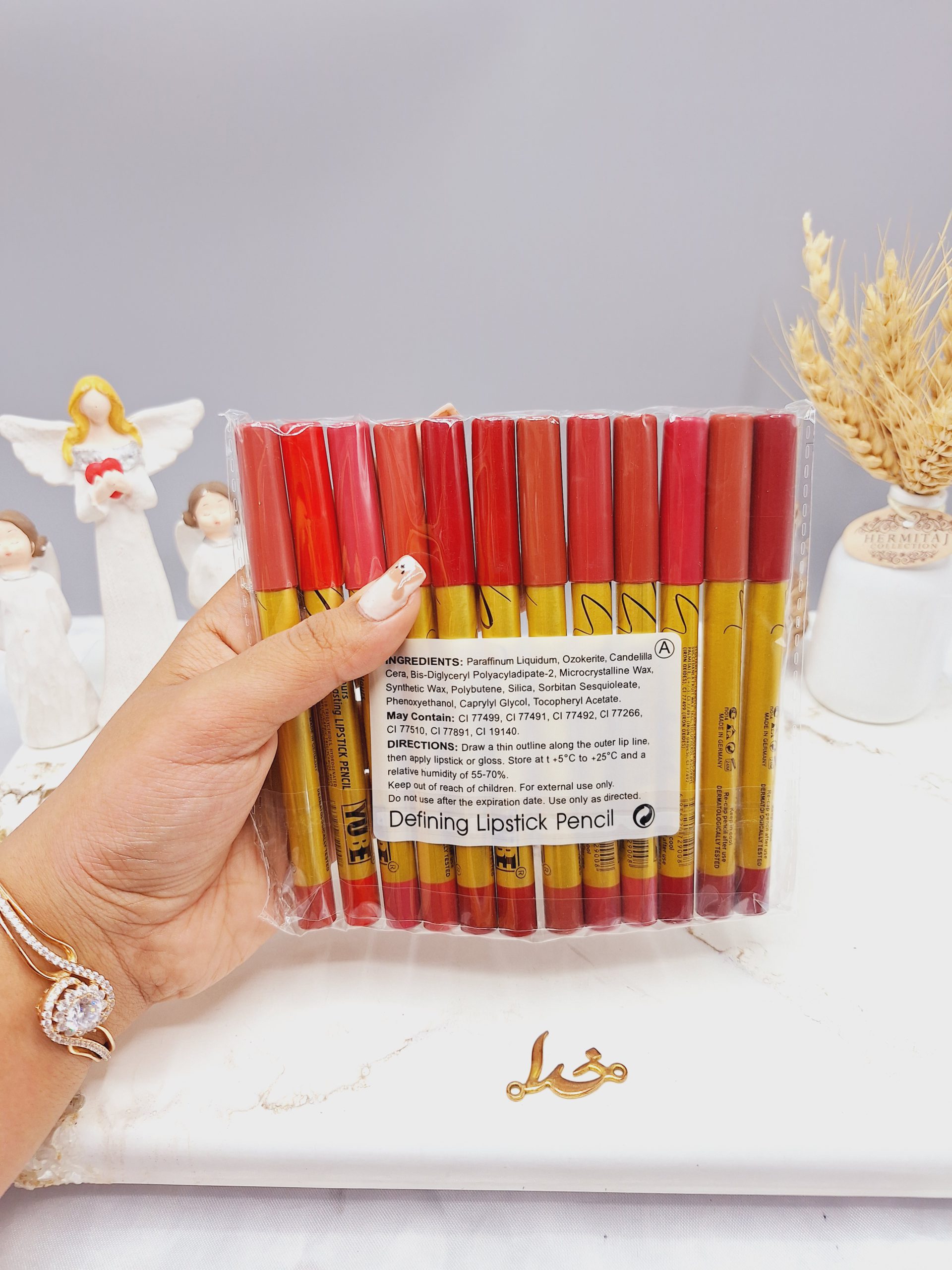 پک 12 تایی رژ مدادی برند YUBE پوکه طلایی کد A