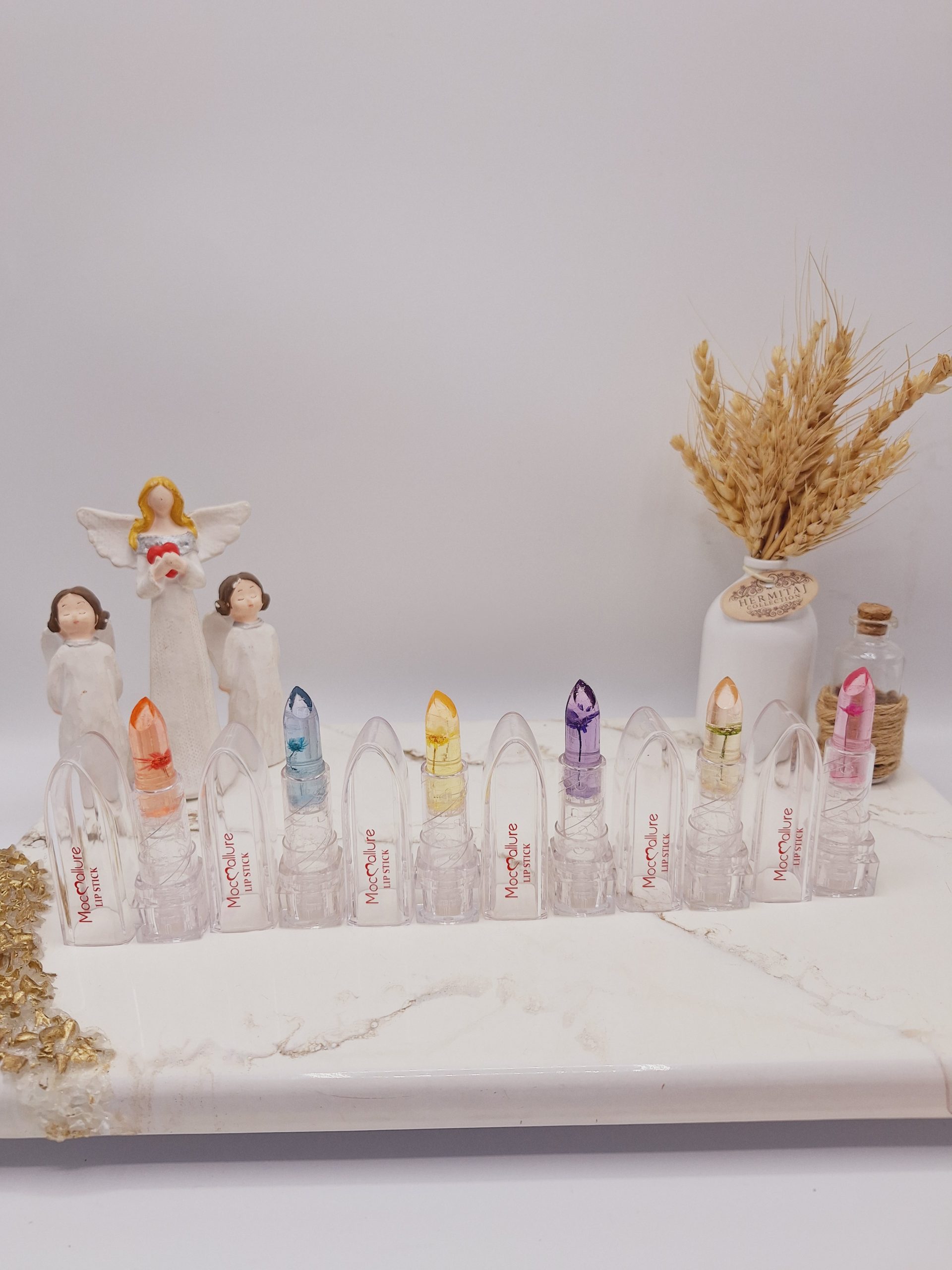 بالم لب حرارتی رنگارنگ پوکه شیشه ای برند موکالره کد 8108