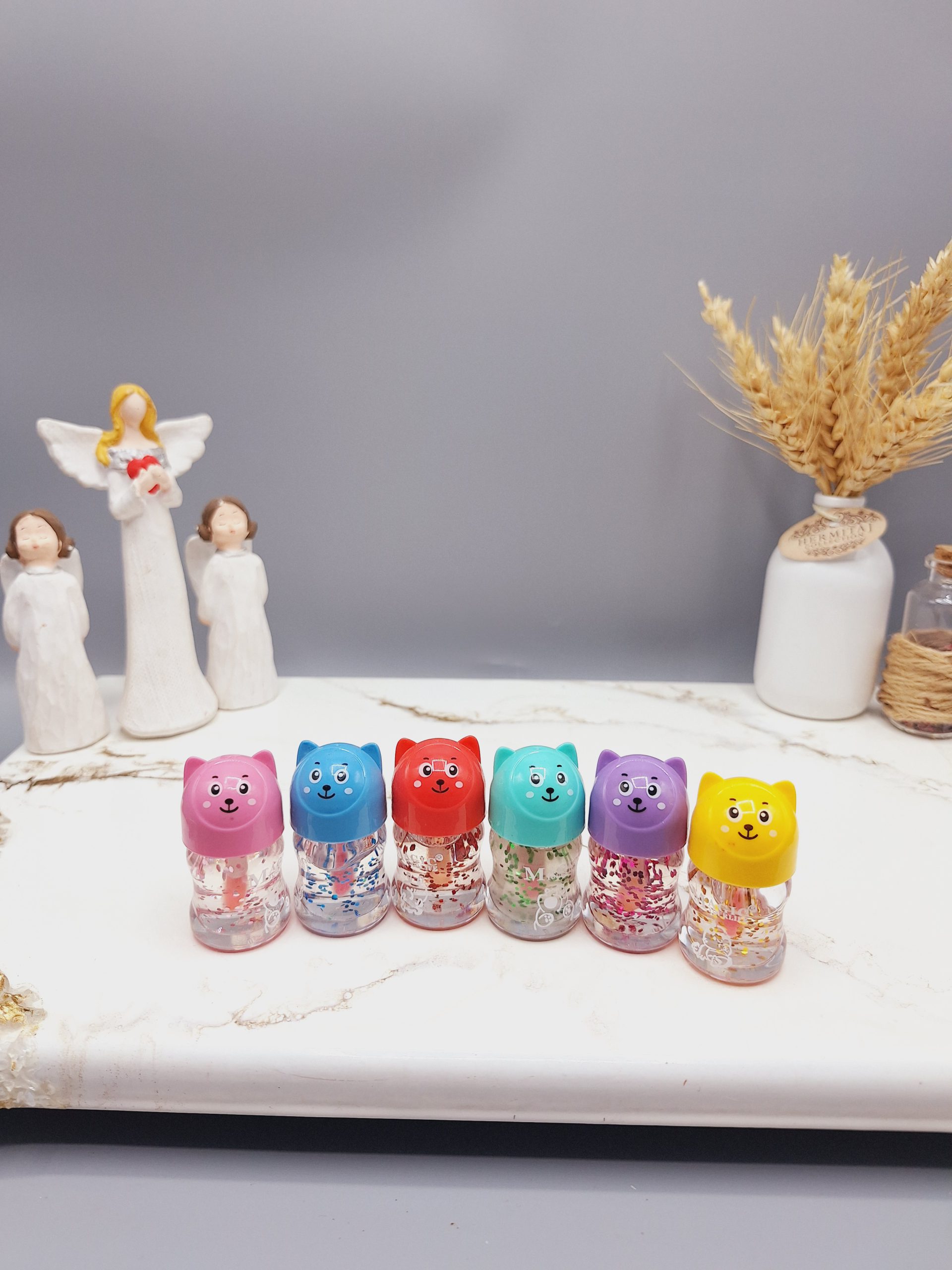 لیپ گلاس شاین دار طرح خرس کوچولو برند MAGIC کد 881