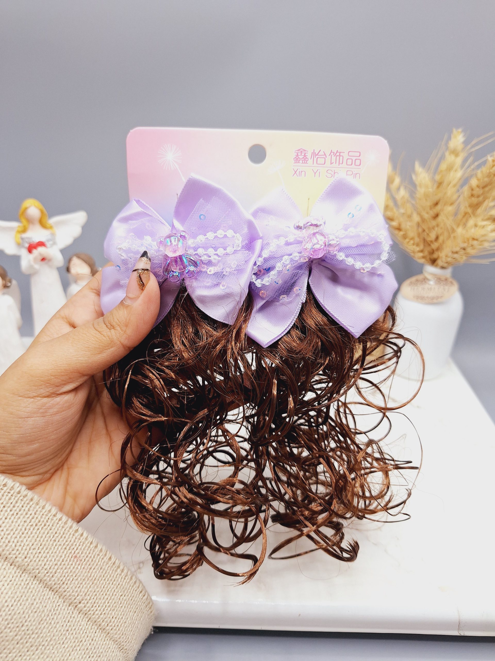 گیره مو دخترونه پاپیون طرح گل مرواريدی با موی مصنوعی (کارت دوتایی)