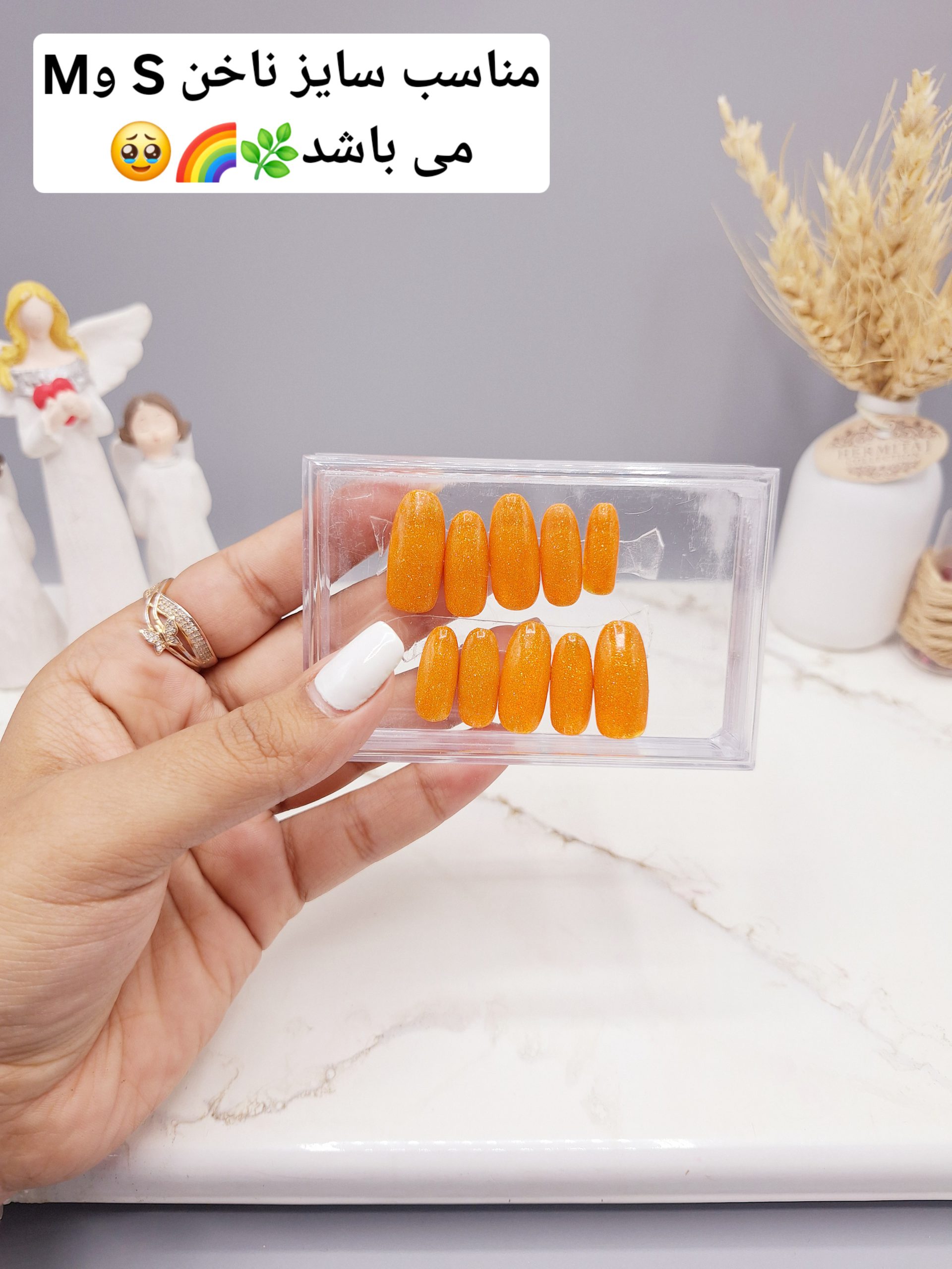 ناخن مصنوعی با مواد کاشت درجه ۱ طرح ساده و شیک رنگ نارنجی شاین دار (به همراه پک اختصاصی)