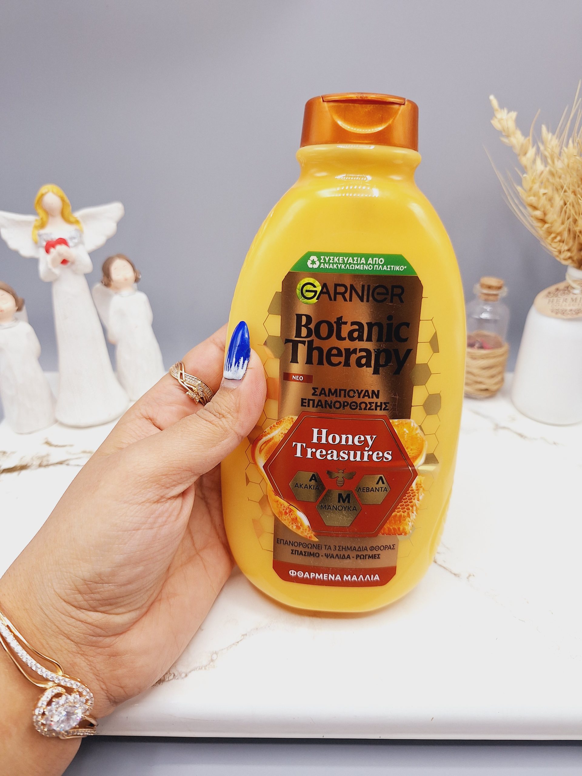 شامپو ترمیم کننده گیاهی و درمانی گنجینه های عسل برند گارنیر اصلی حجم 400 میل کد 1948