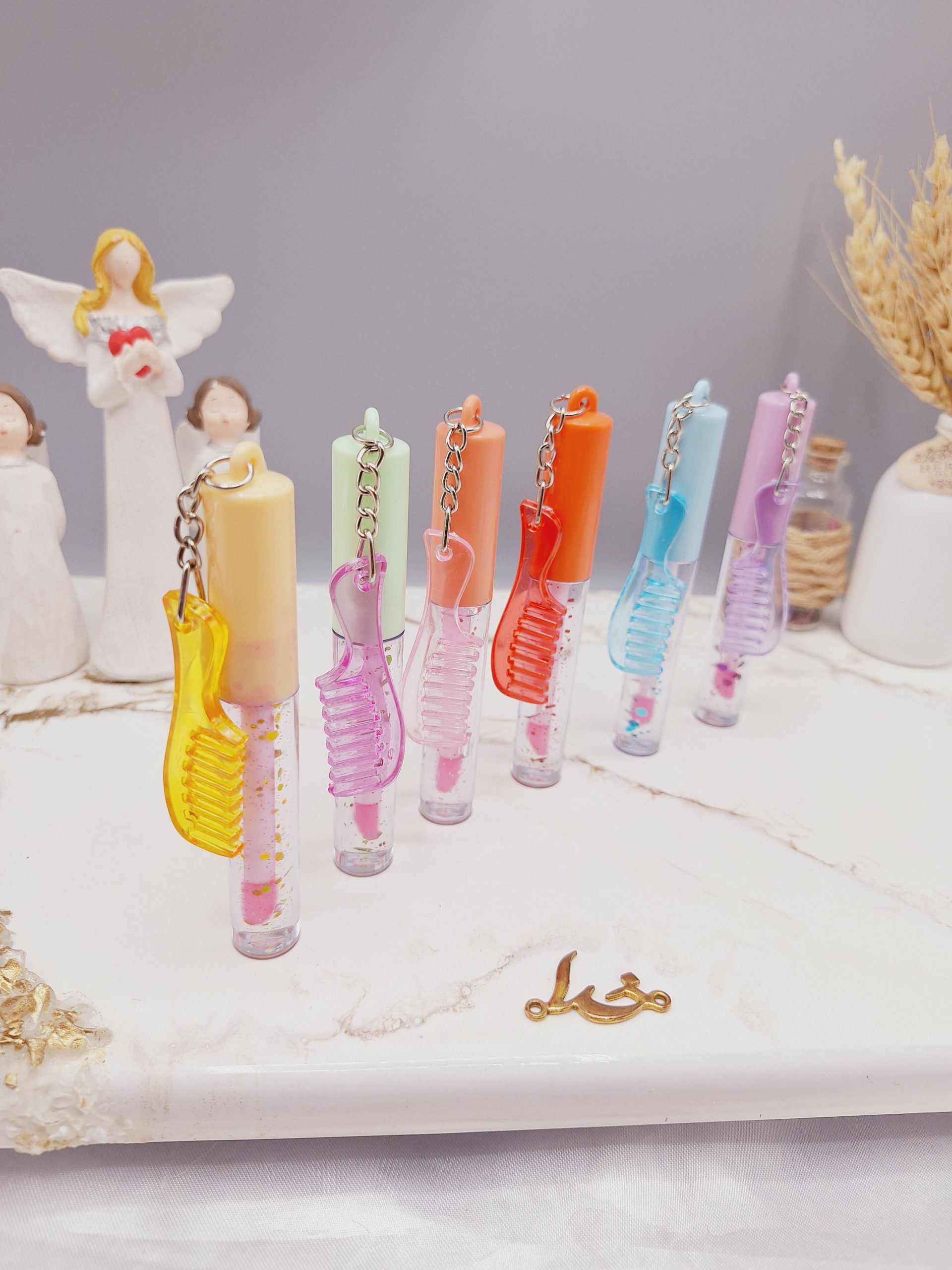 لیپ گلاس گلیتر دار طرح شانه ای برند مجیک کد LC32