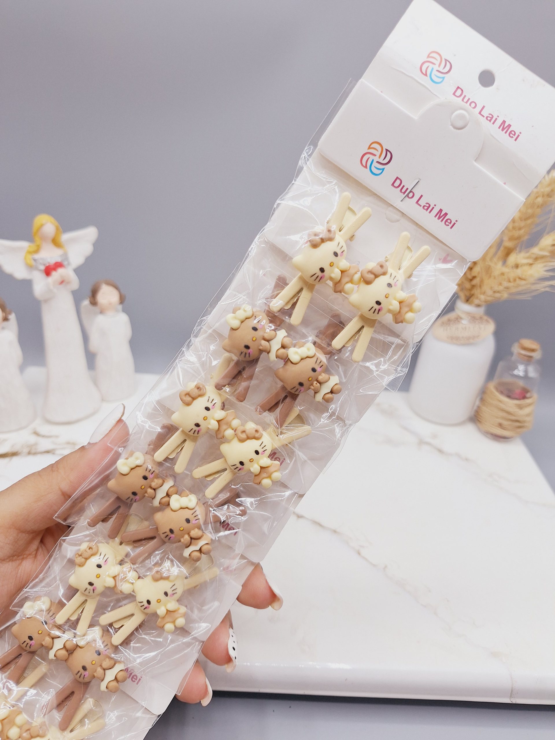 پک کارت 10 تایی گیره مو دوتایی طرح کیتی نود