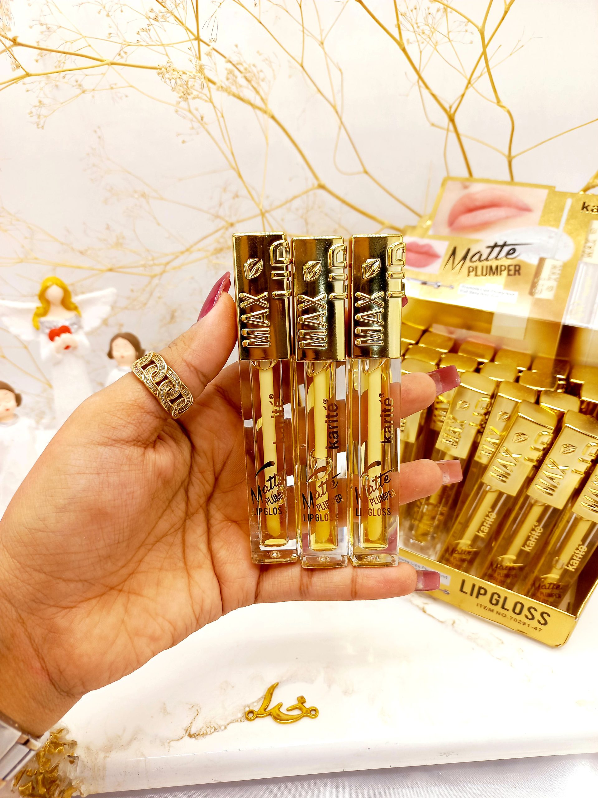 لیپ گلاس و حجم دهنده لب کاریته karite کد 70291