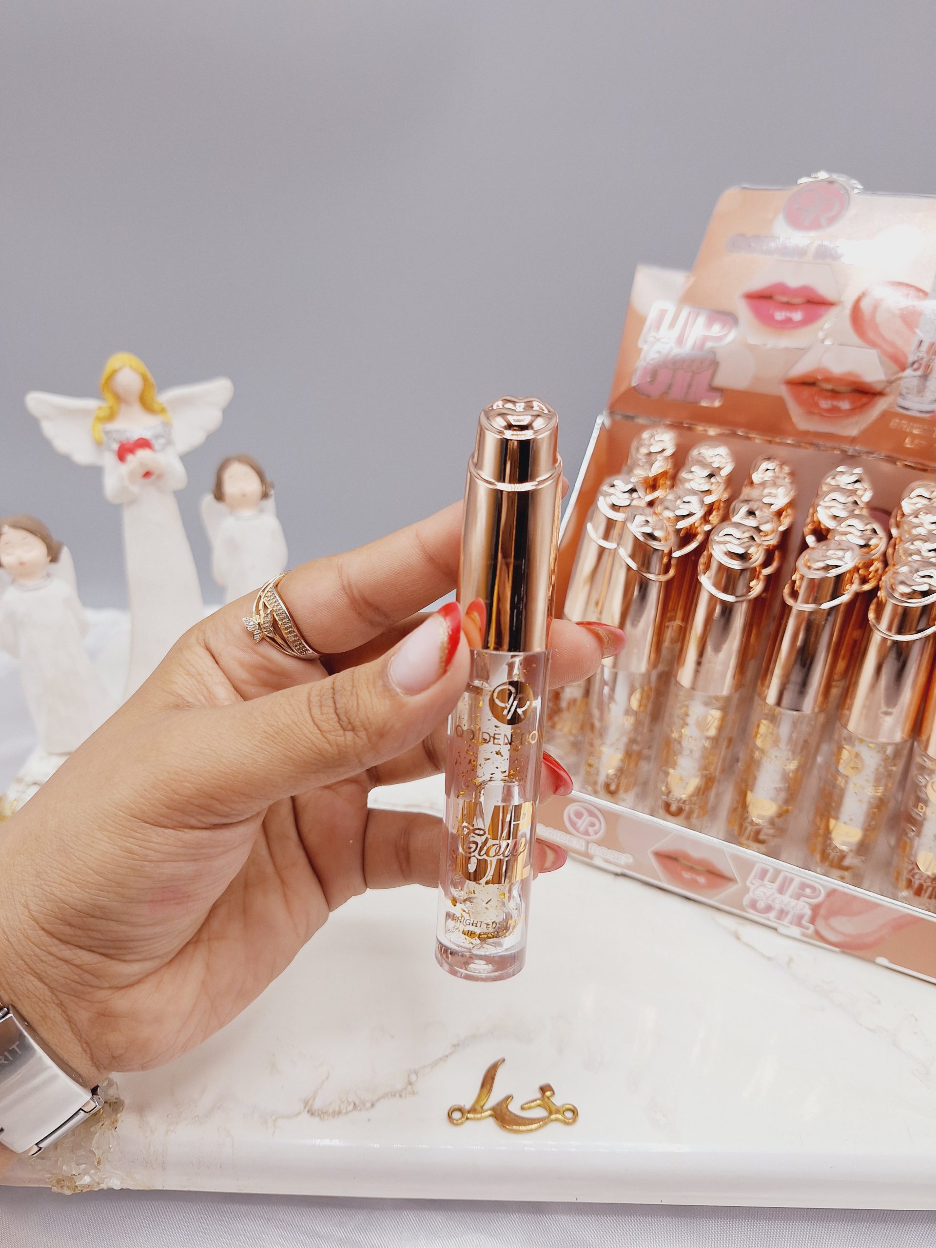 لیپ گلاس ورق طلا طرح لب برند OOIDEN ROSE کد 1348