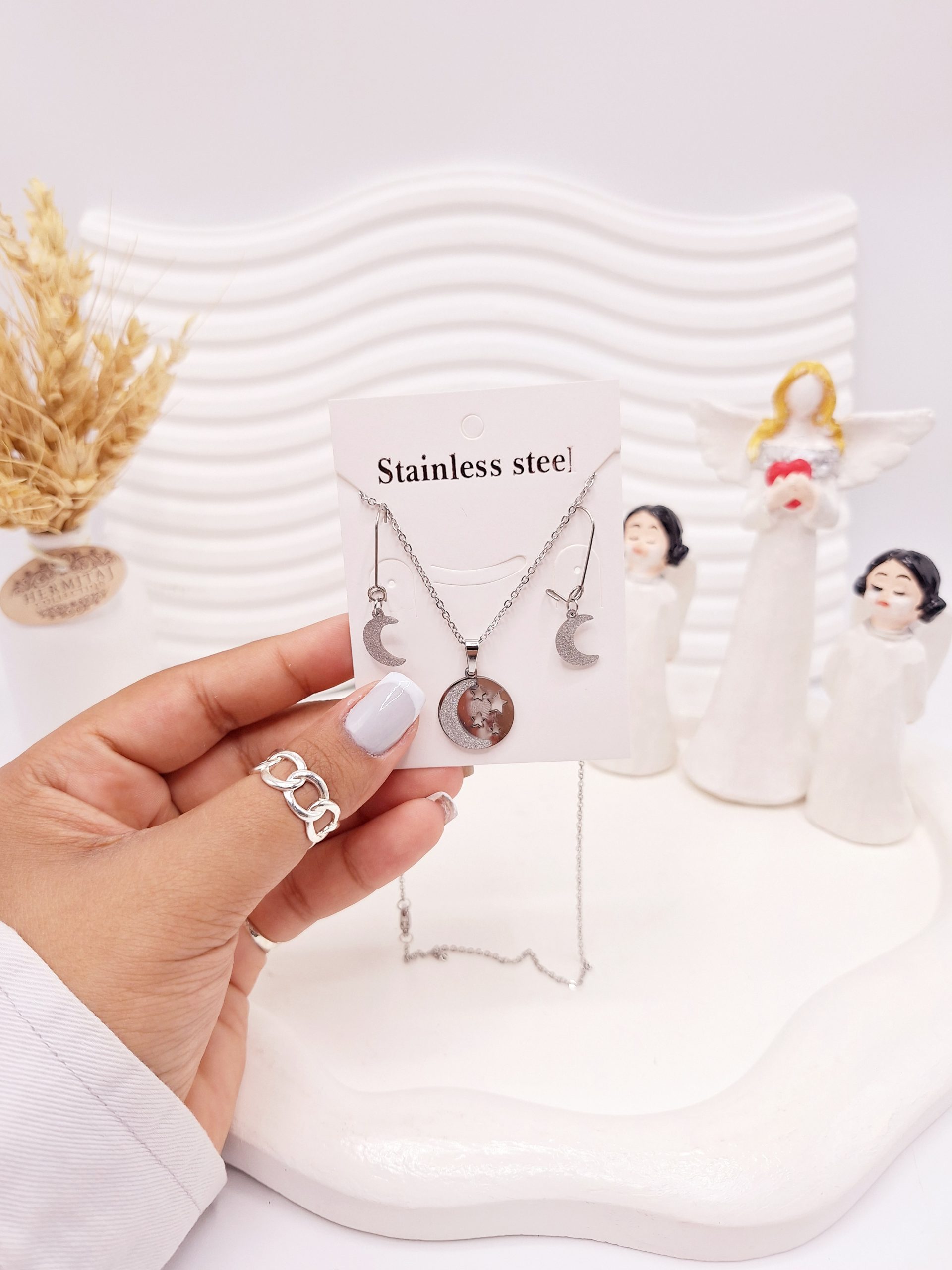 ست گوشواره و گردنبند طرح ماه و ستاره نقره ای استیل