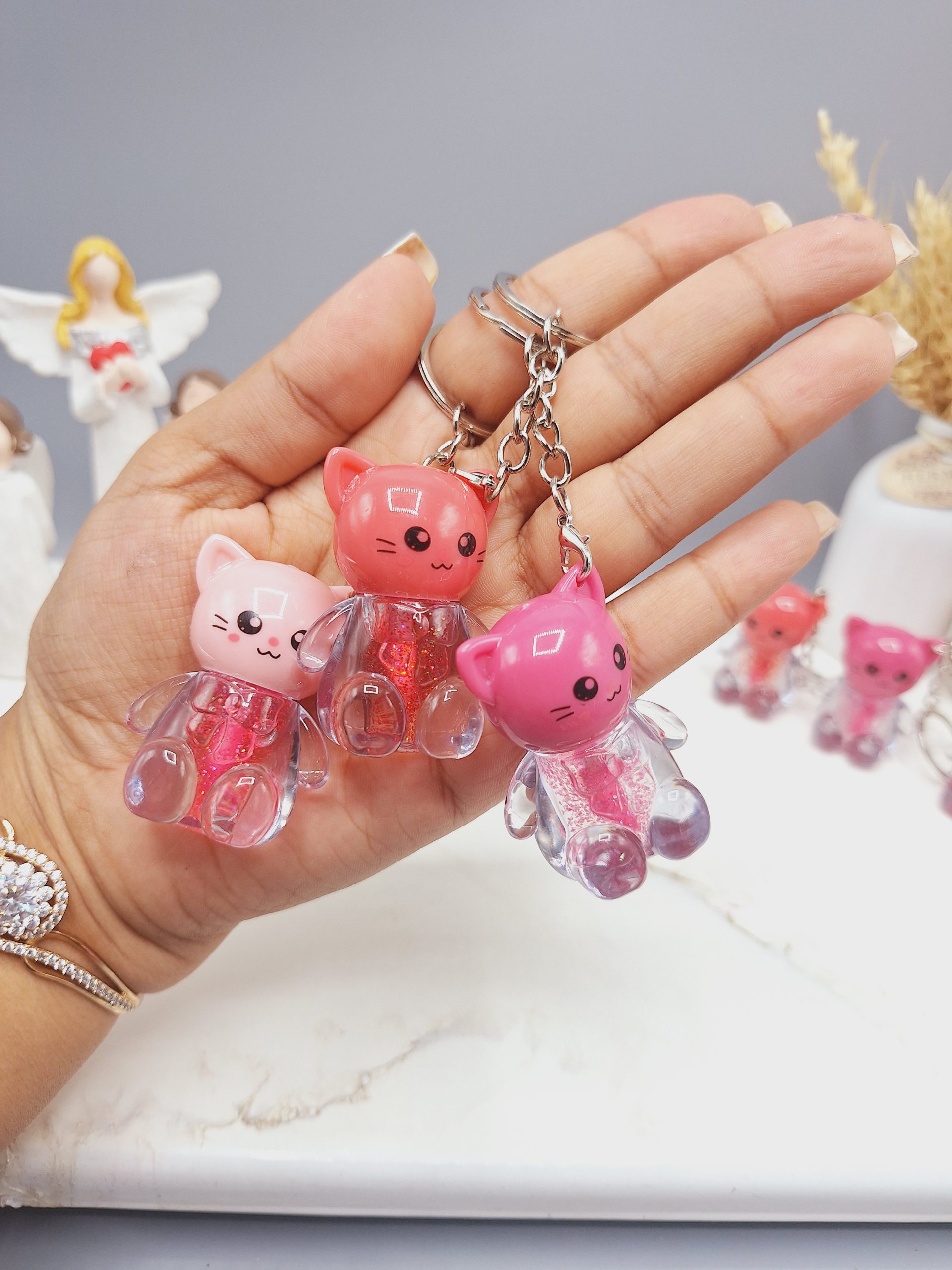 برق لب شاین دار طرح گربه آویز دار کیوت برند IMAN OF NOBLE کد 7149