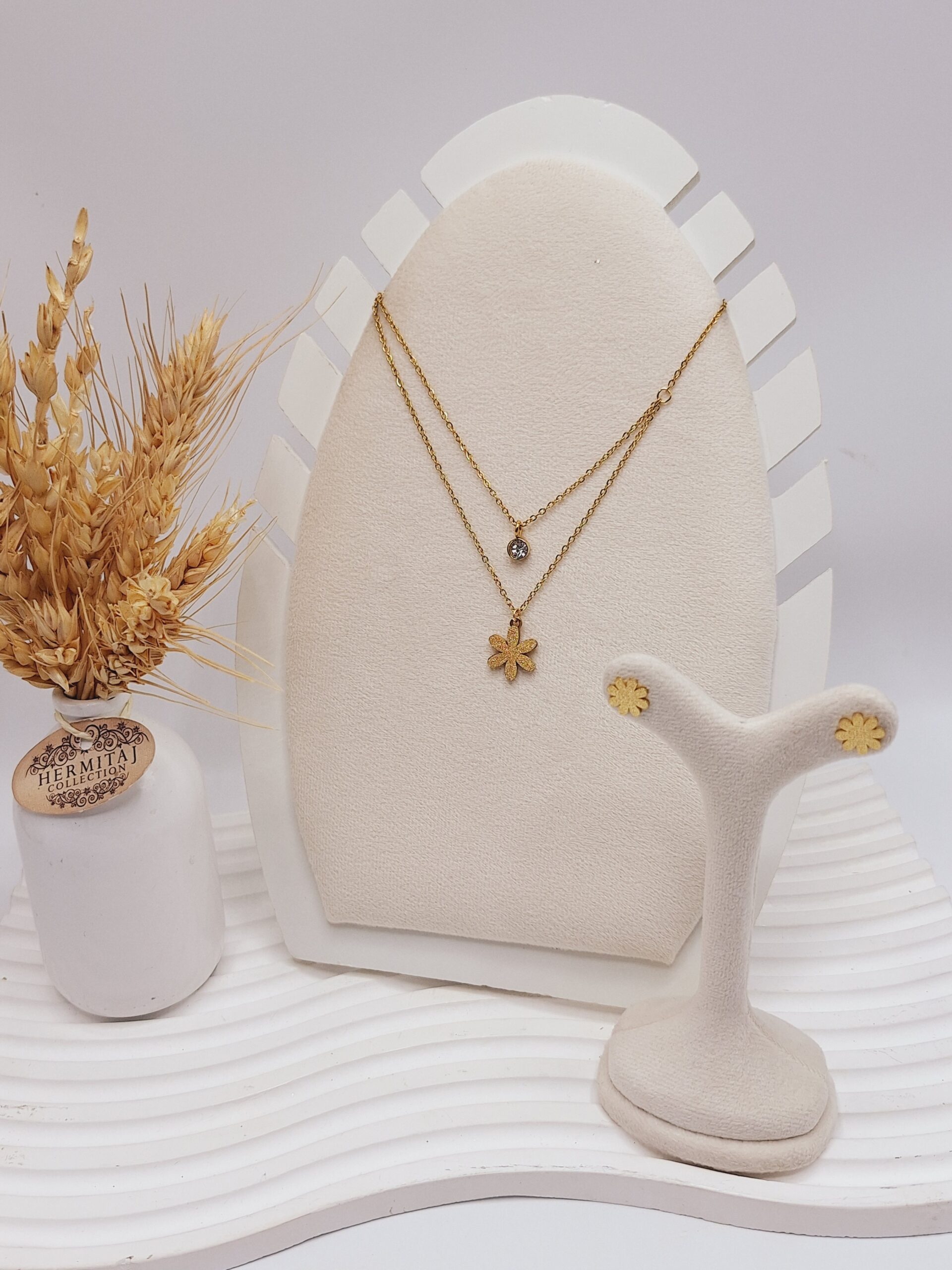 ست گوشواره و گردنبند طرح گل طلایی استیل