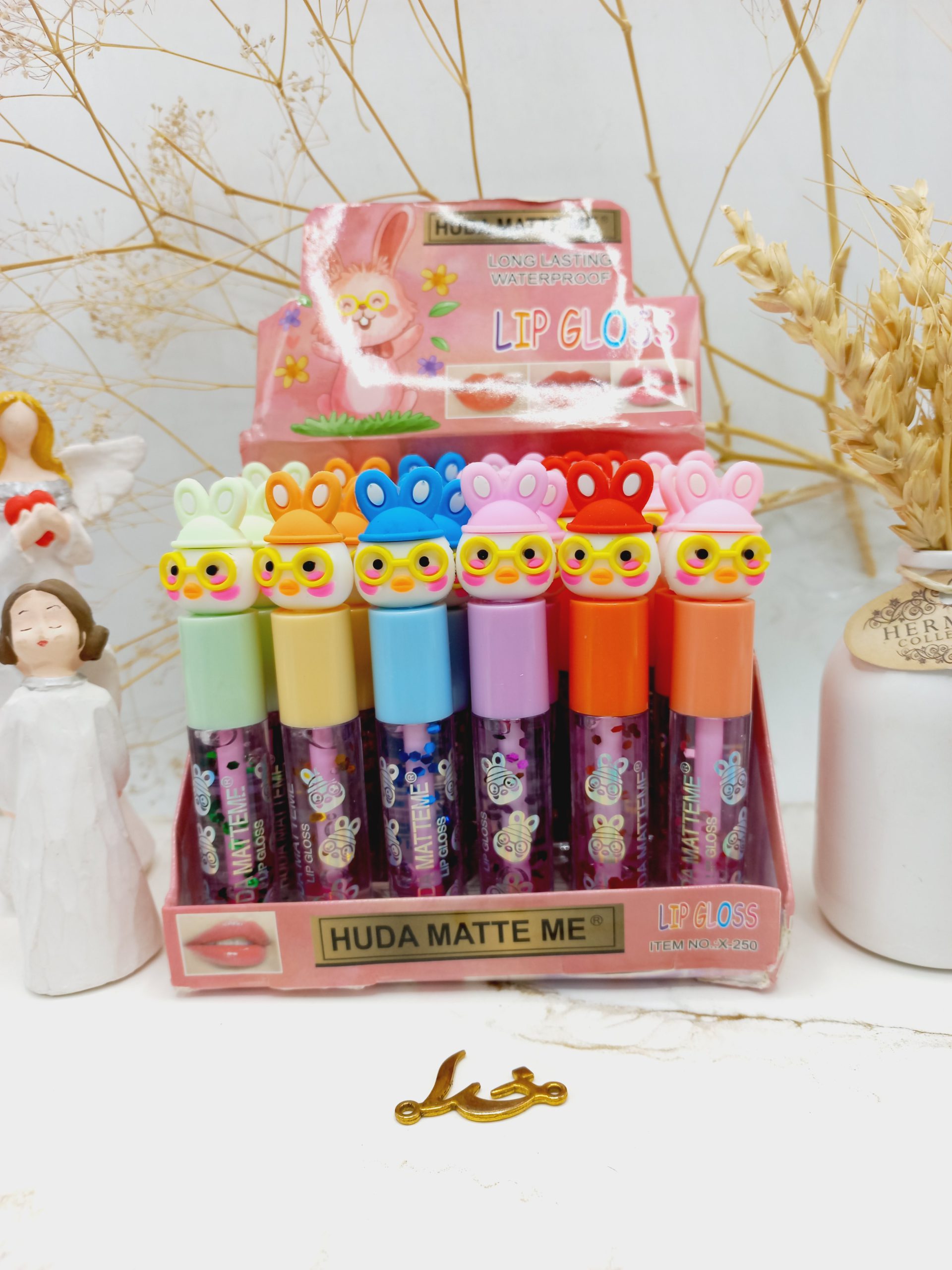 برق لب طرح جوجه هدی مات می HUDA MATTE Me کد X250