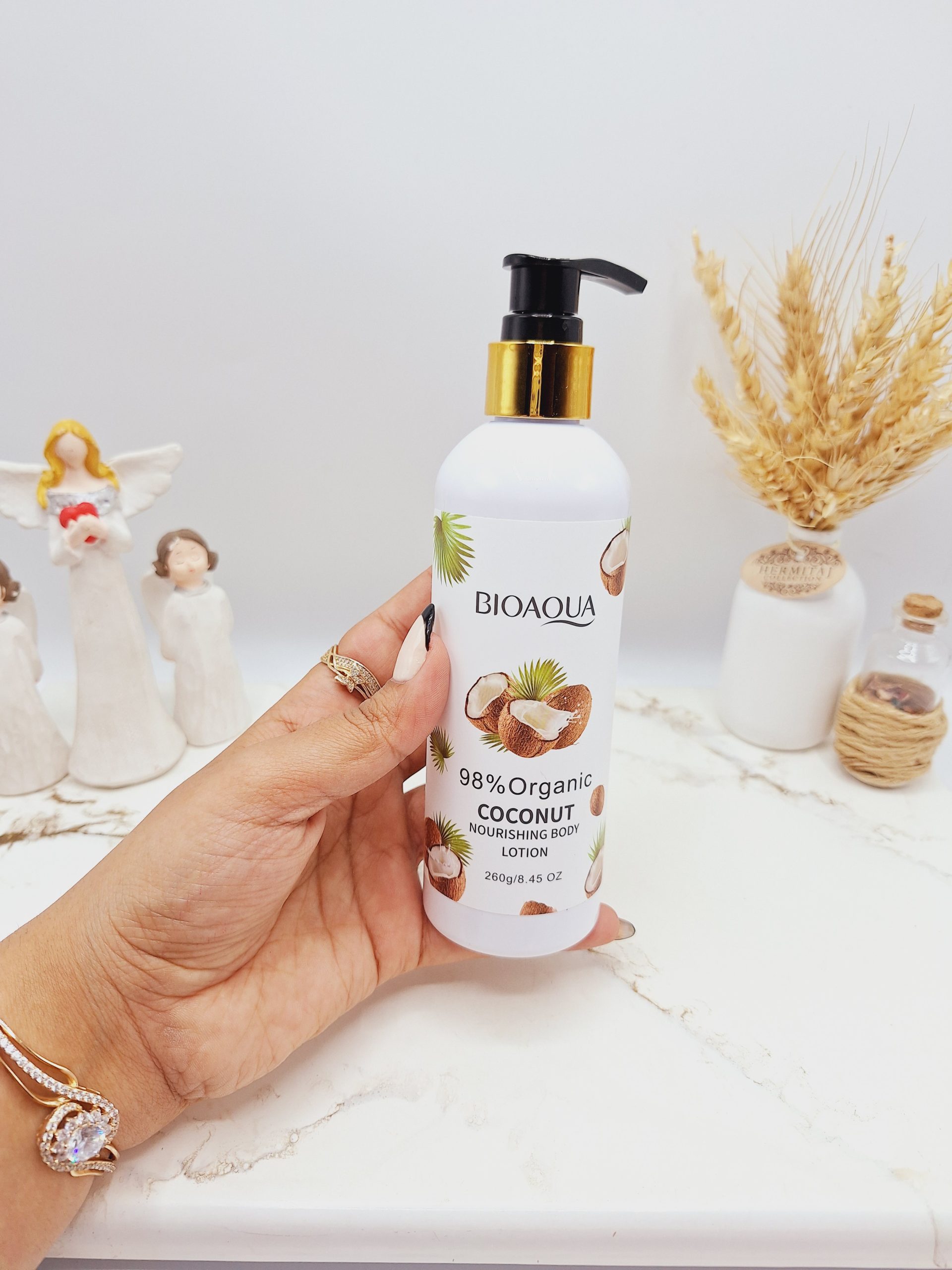 لوسیون بدن پمپی نارگیل بیواکوا رفع زبری پوست بدن خوشبو کننده پوست کد 2827