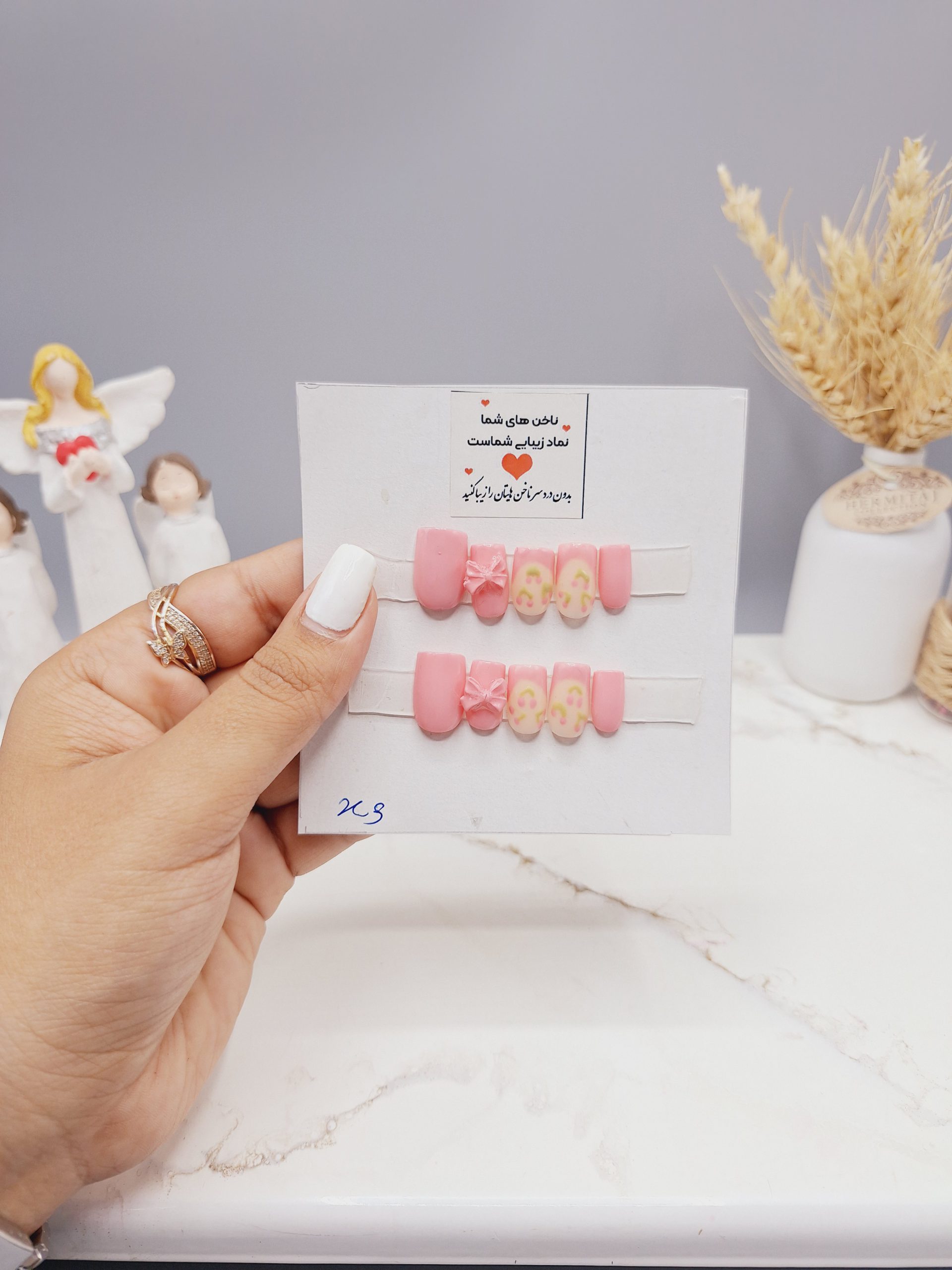 ناخن مصنوعی پا با مواد کاشت درجه ۱ طرح پاپیون و گل صورتی (به همراه پک اختصاصی)