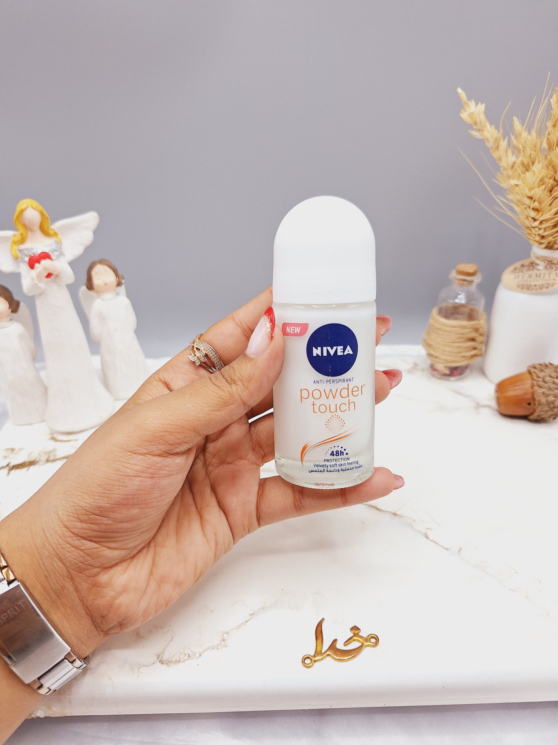 مام رولی نیوآ NIVEA مدل POWDER touch کد 1918