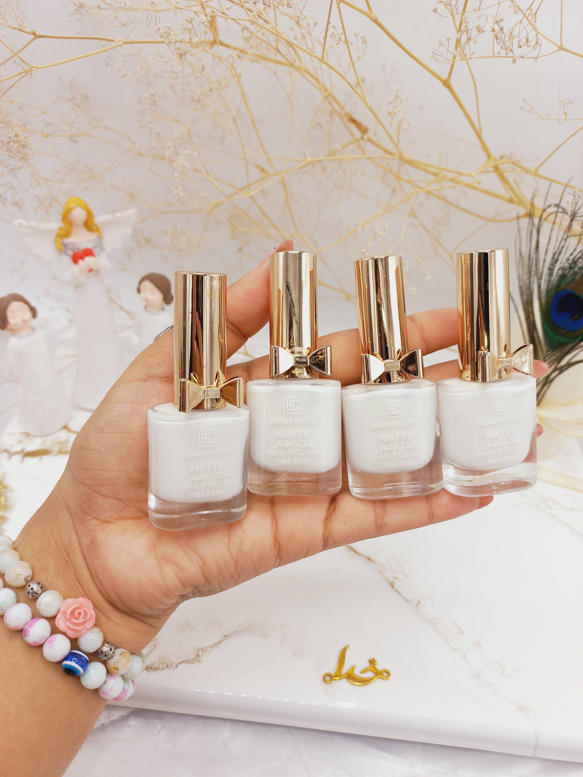 لاک پرطرفدار پاپیونی سفید برند بیوتی سیتی BEAUTY CITY کد XU0047