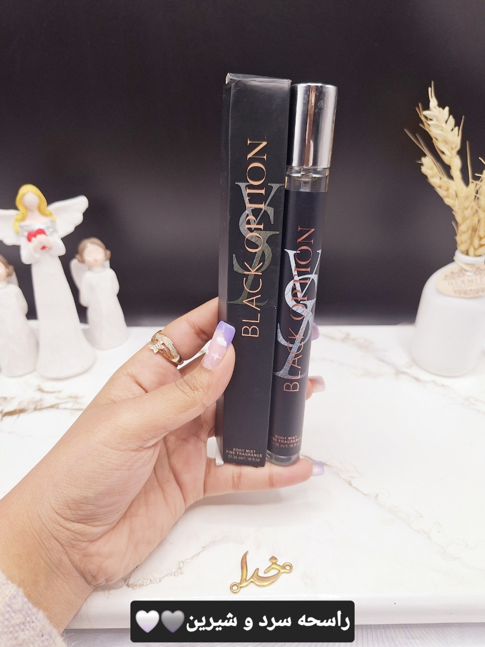 ادکلن استوانه ی 35ml BLACK OPTION کد 1363