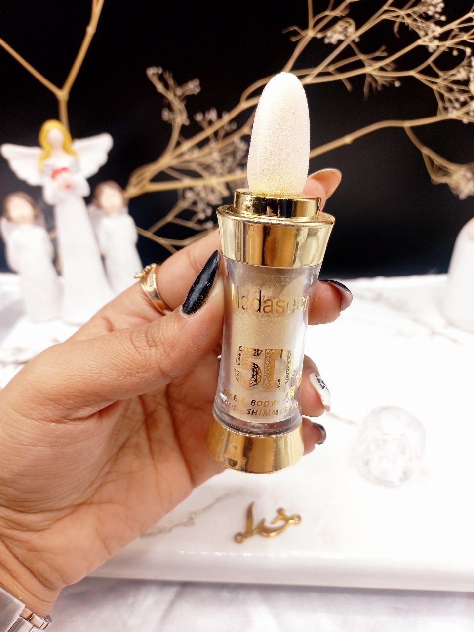 هایلایتر پودری صورت و بدن ضدآب مدا سکرت Modq Secret کد0005