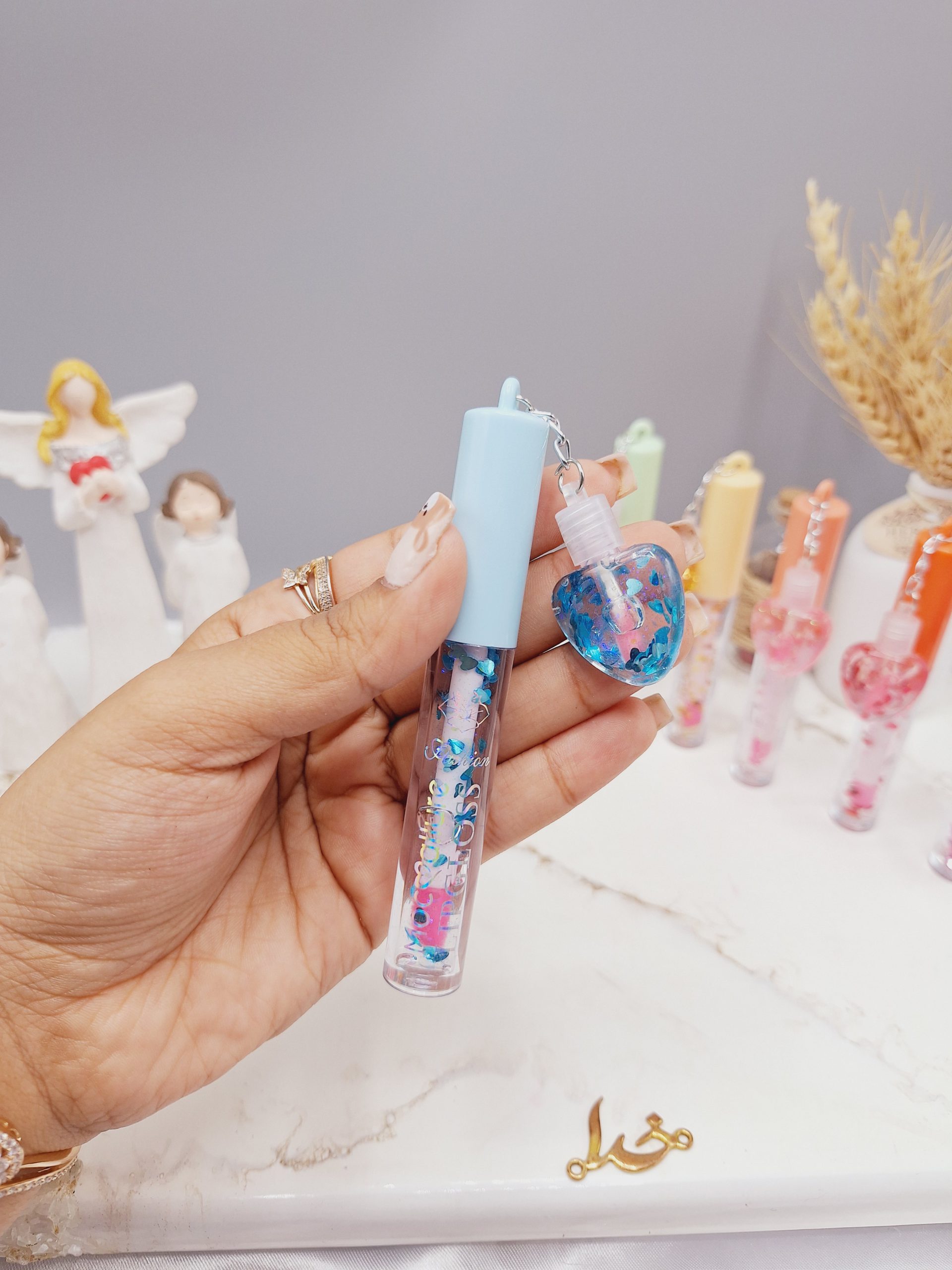 ست 2 تایی لیپ گلاس گلیتری طرح قلب برند موکالره Mocallure کد 125