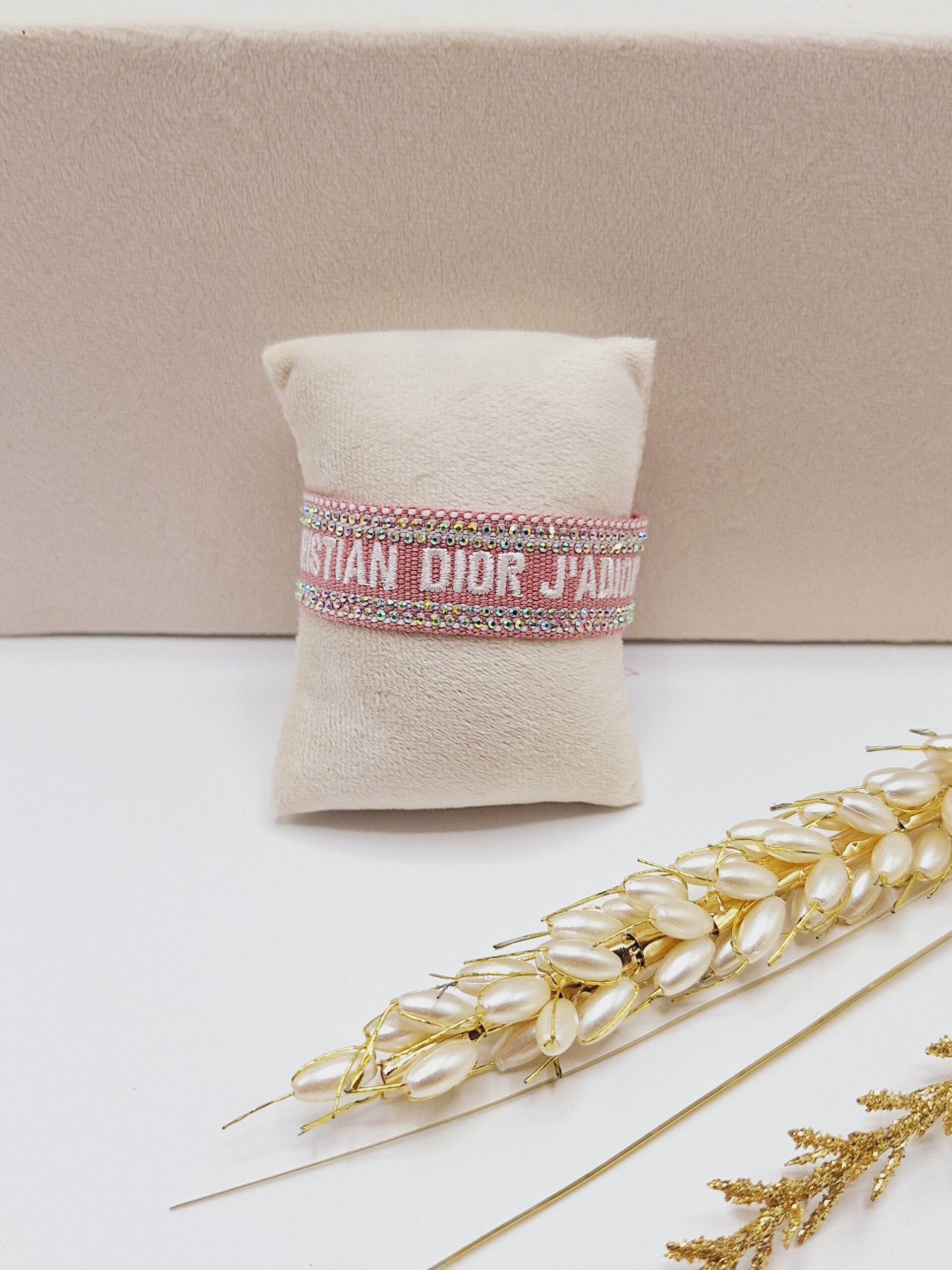 دستبند پارچه ای نگین دار CHRISTIAN DIOR (رنگ گلبهی)