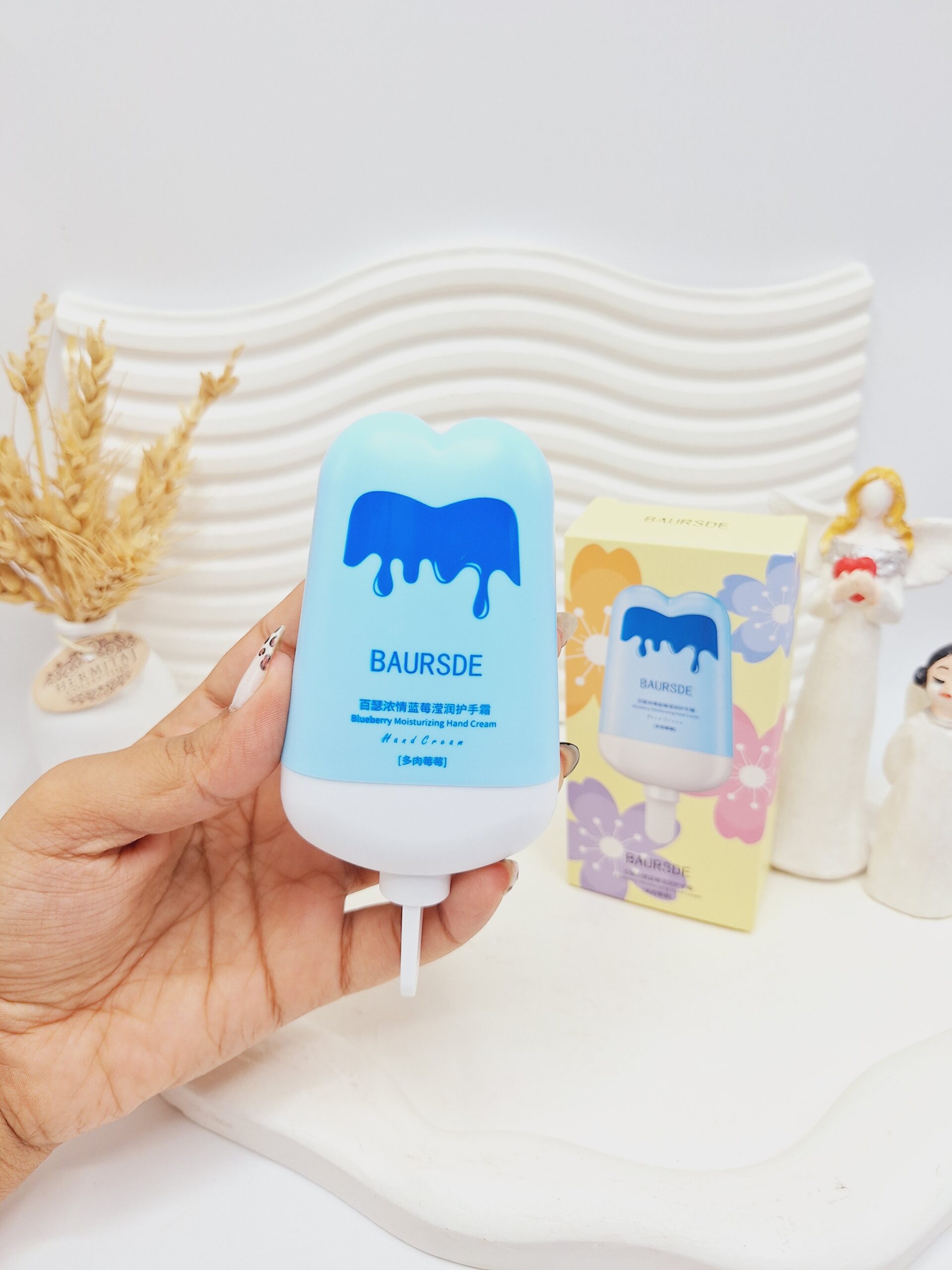 کرم دست مرطوب کننده و آبرسان طرح بستنی چوبی رنگ آبی BAURSDE کد 7297