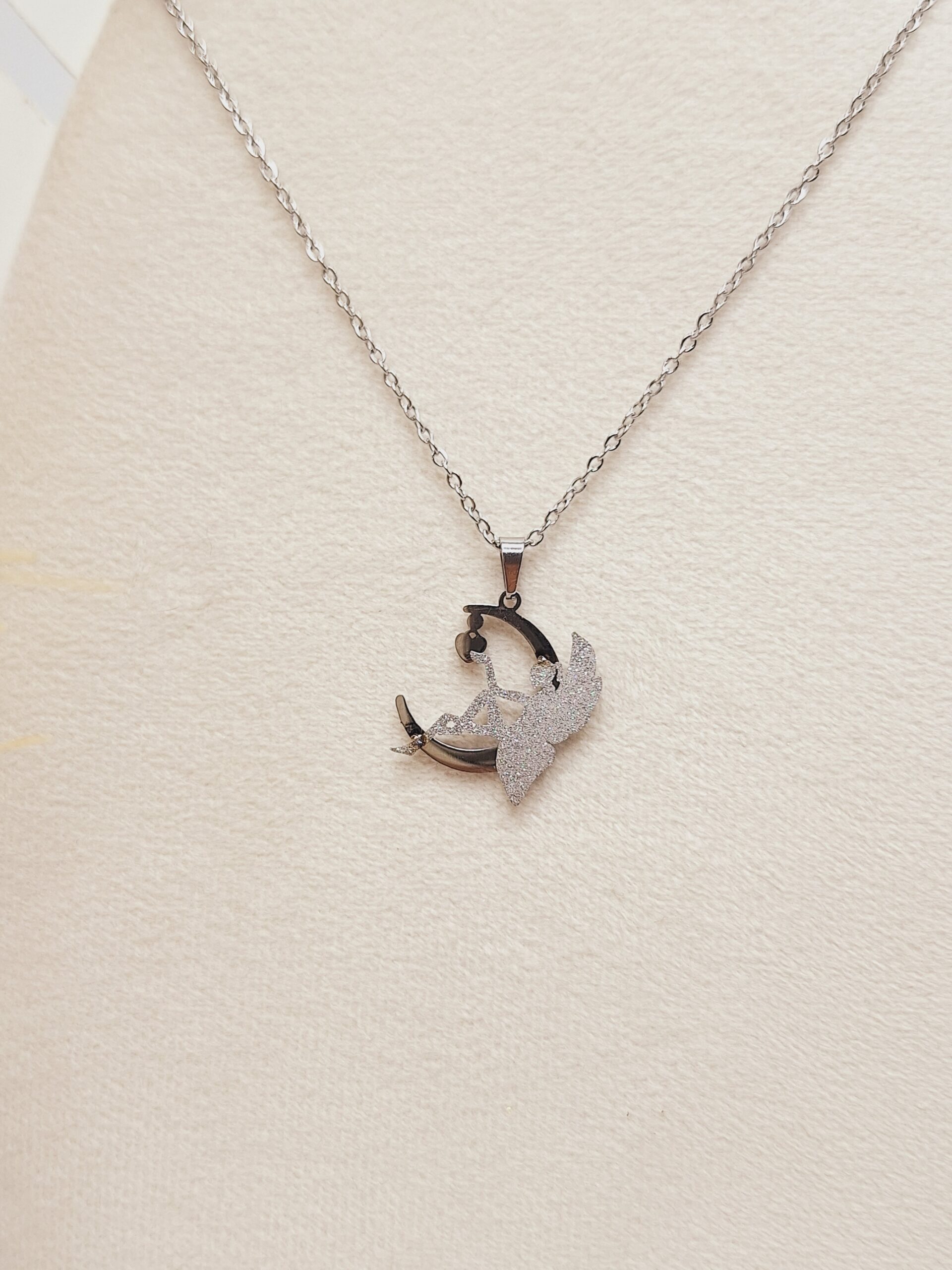 ست گوشواره و گردنبند طرح فرشته و ماه  نقره ای استیل