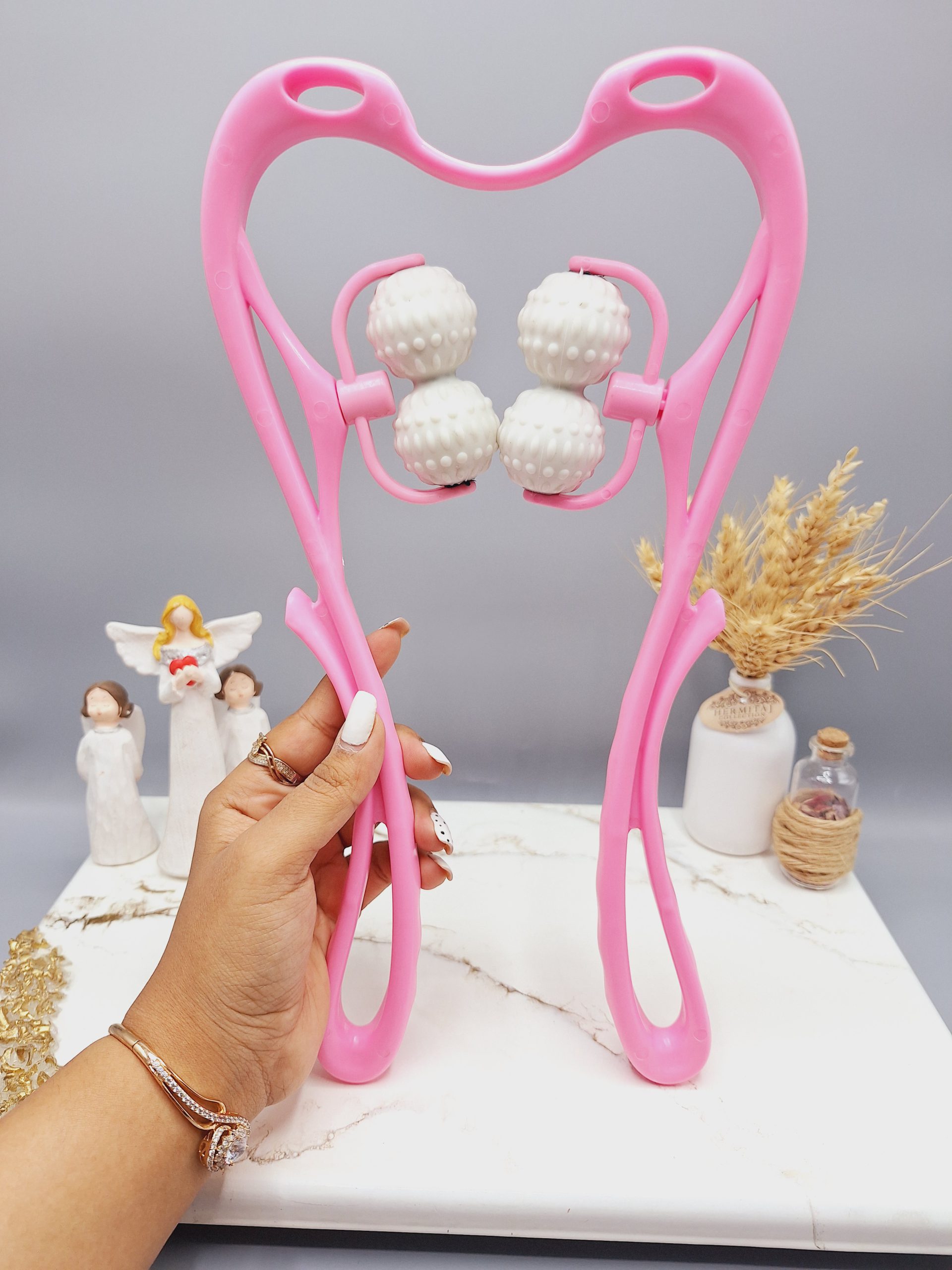 ماساژور غلتطکی گردن مدل ۴ رول (صورتی)