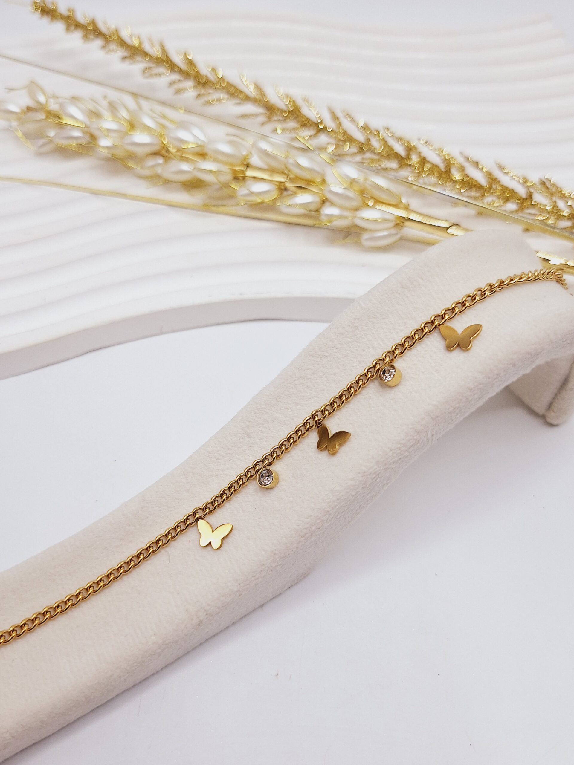 پابند زنجیری طرح پروانه و نگین طلایی