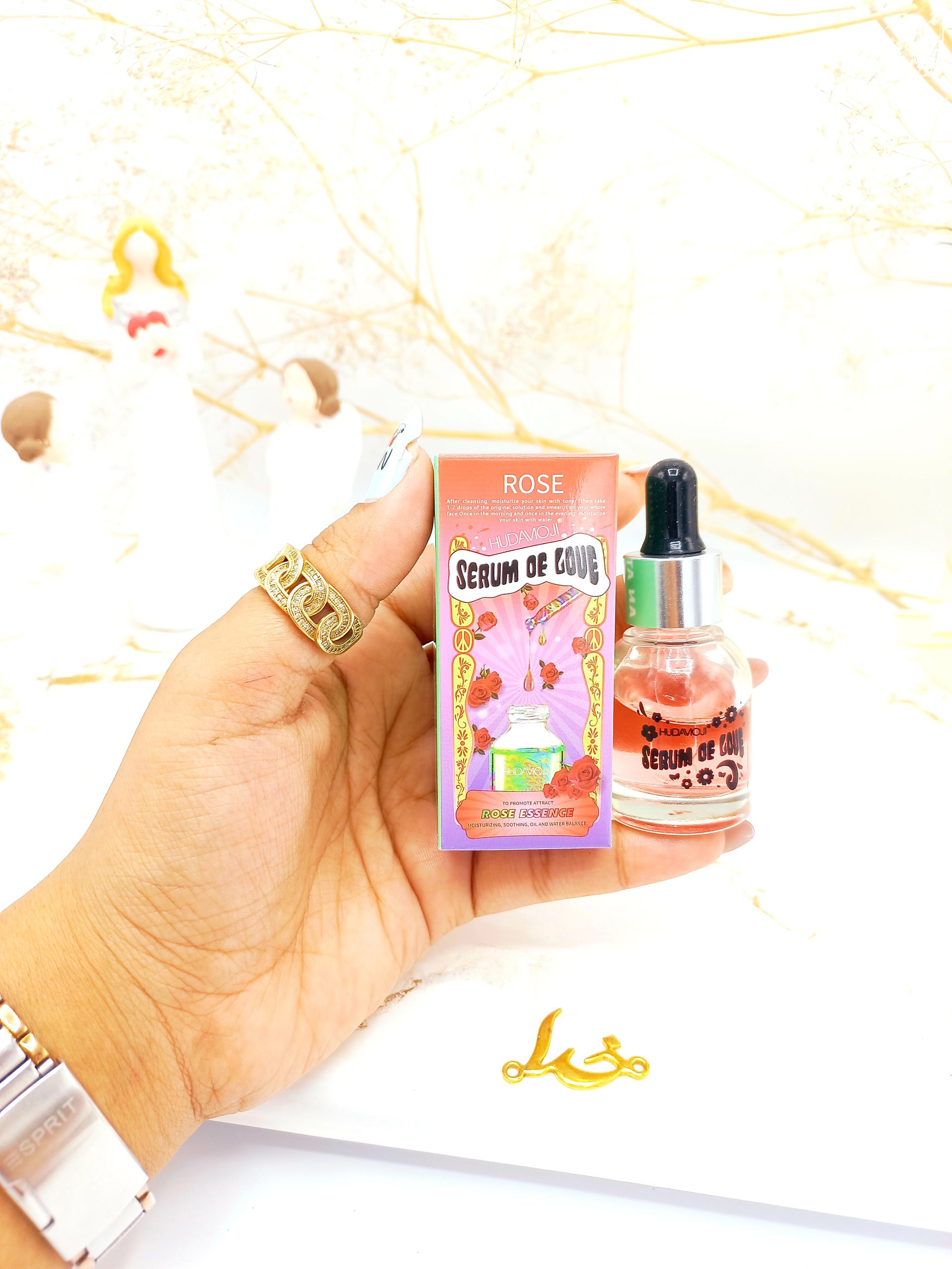 سرم روشن کننده پوست مدل گل رز هدی موجی HUDA MOJI حجم 20 ml کدEC001