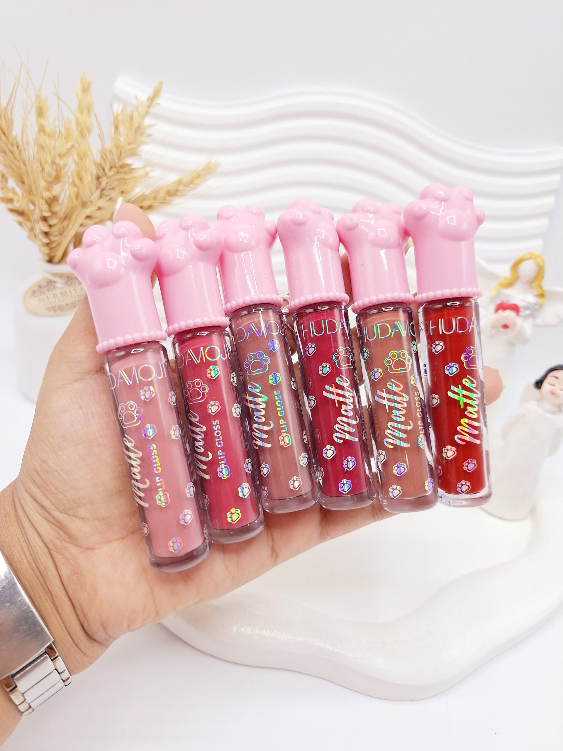 پک 6 تایی رژ مایع طرح پنجه صورتی برند هدا موجی کد 016