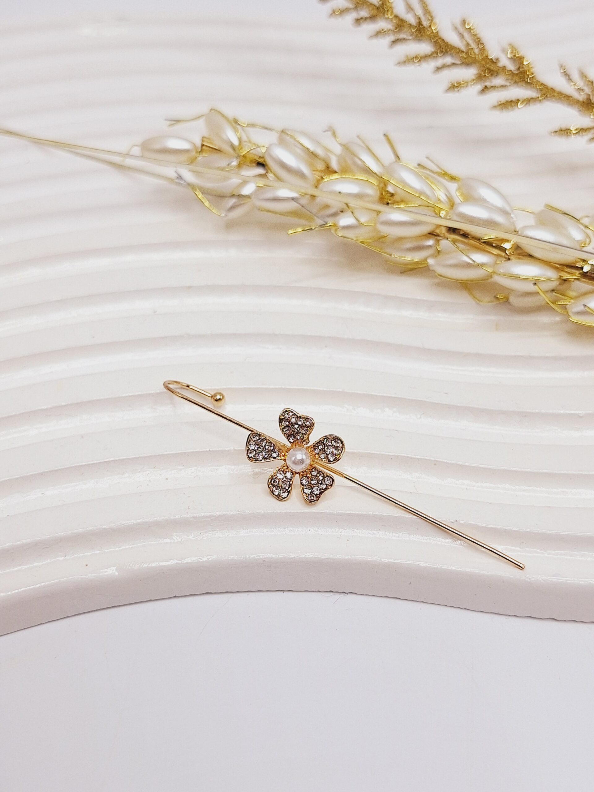 گوشواره ایرکاف طرح گل برجسته طلایی