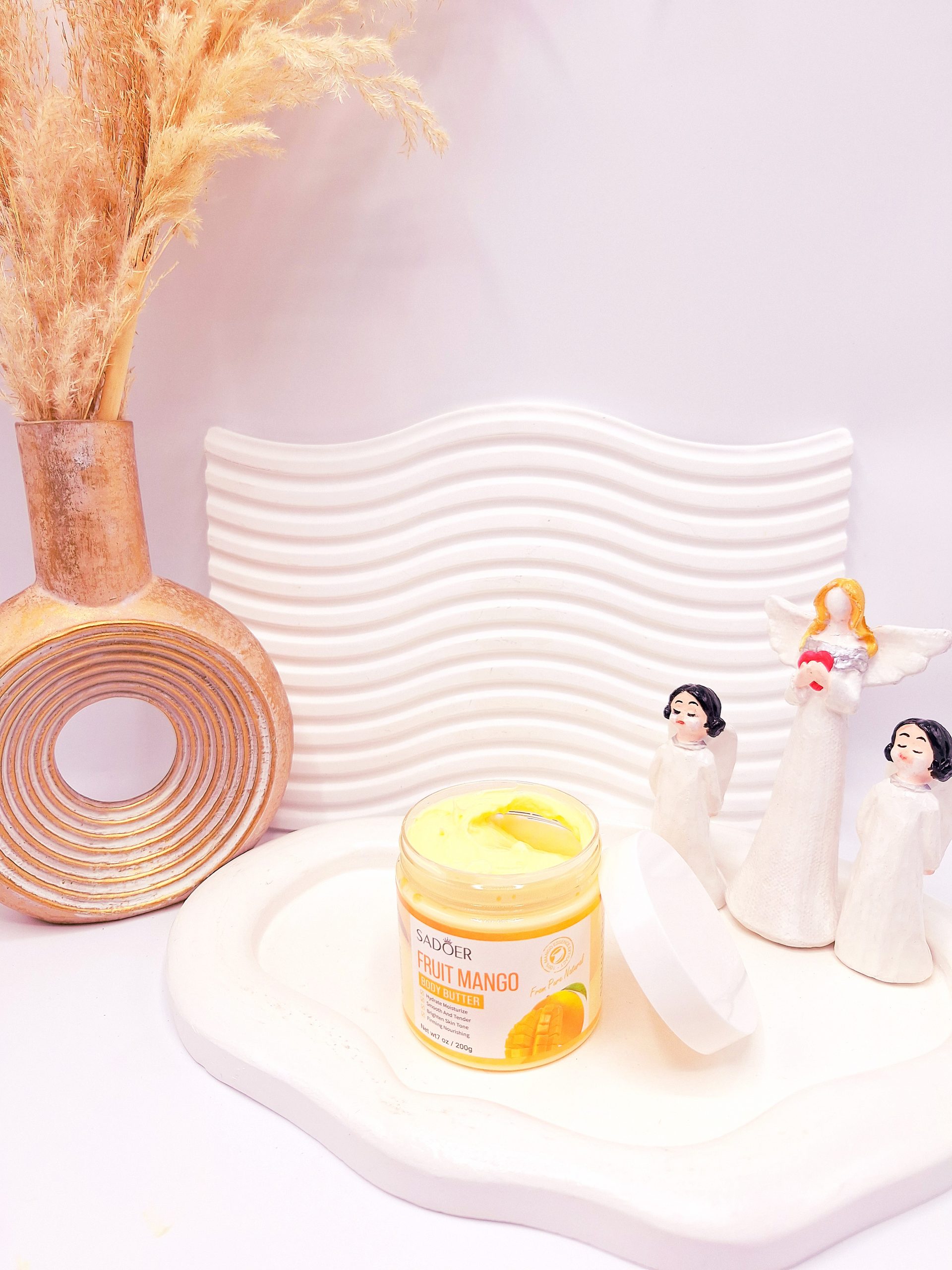 کره بدن رایحه انبه حجم 200 گرم برند sador کد 8021