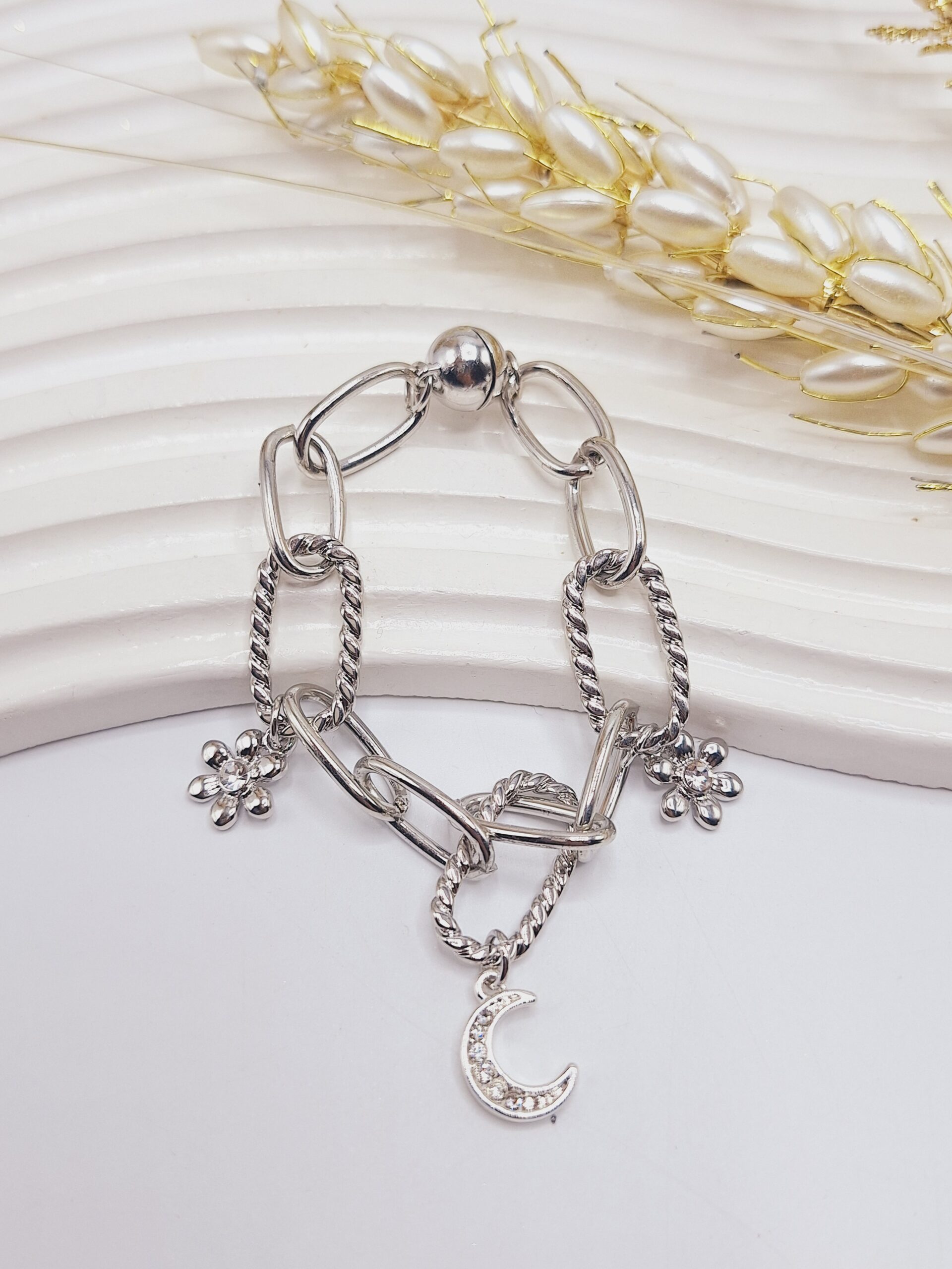 دستبند ترند طنابی طرح گل نقره ای