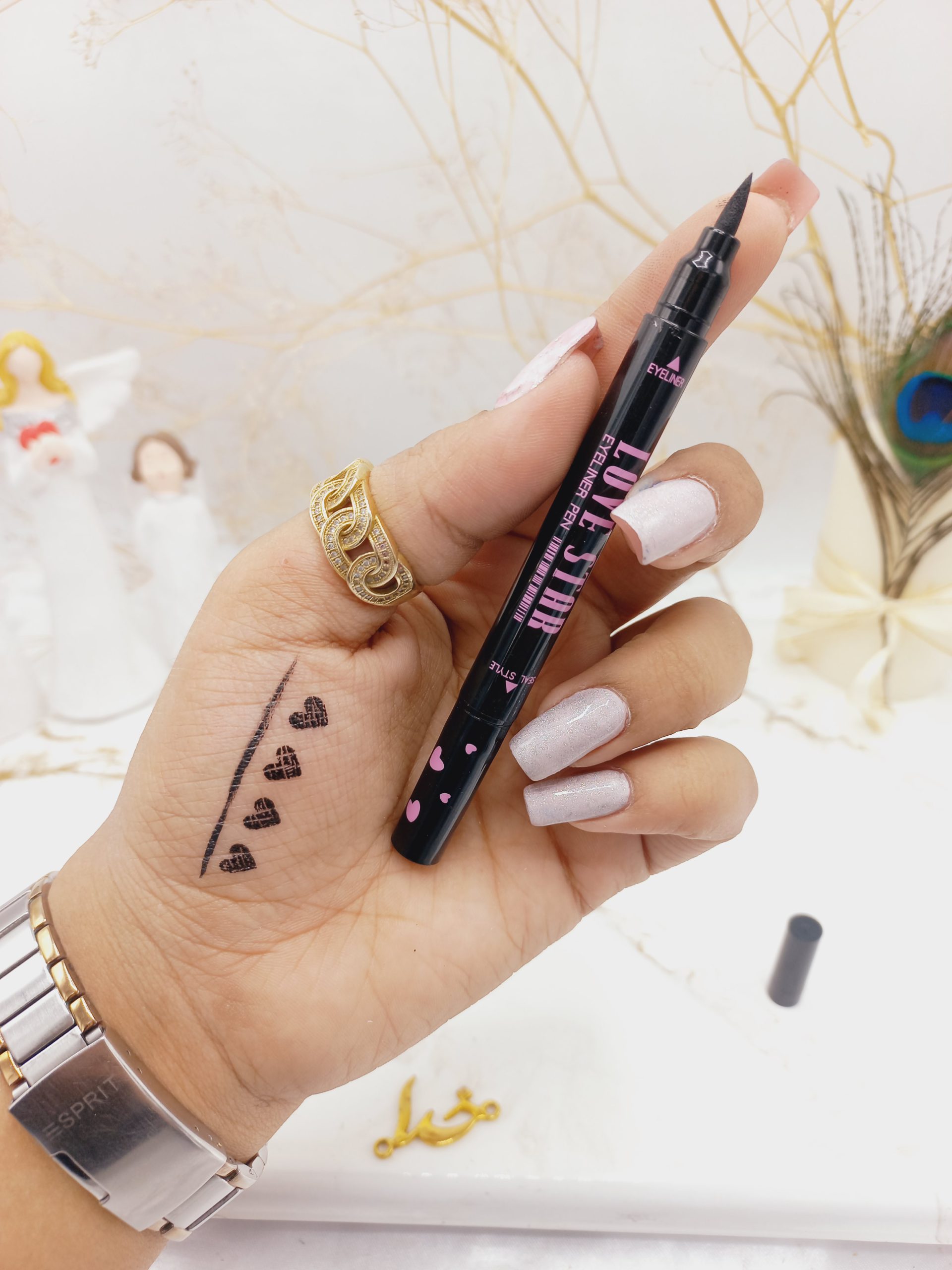 خط چشم مشکی ماژیکی و دوسر طرح دار ستاره ای LOVE STAR ( پوکه بنفش )