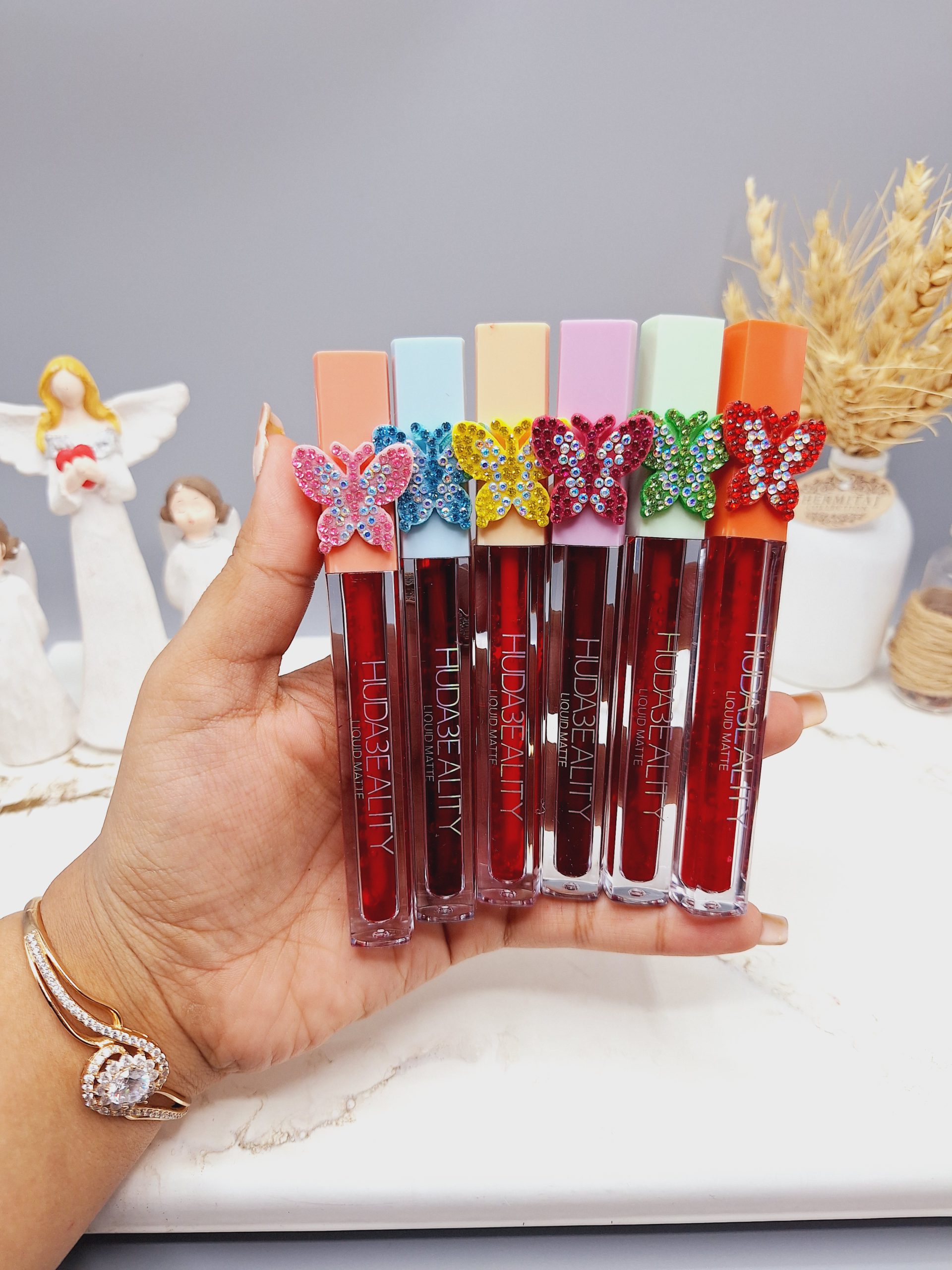 تینت لب پروانه نگینی برند HUDA3EALITY کد 998