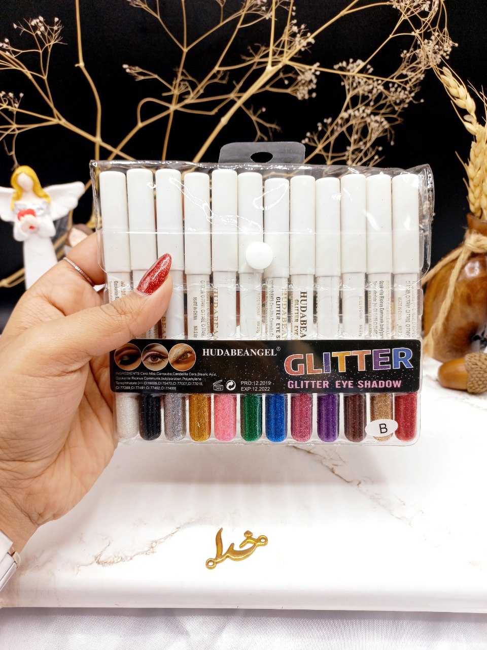 پک رژ مدادی ۱۲ عددی گلیتری برند هدی بانجل HUDABEANGEL پوکه سفید