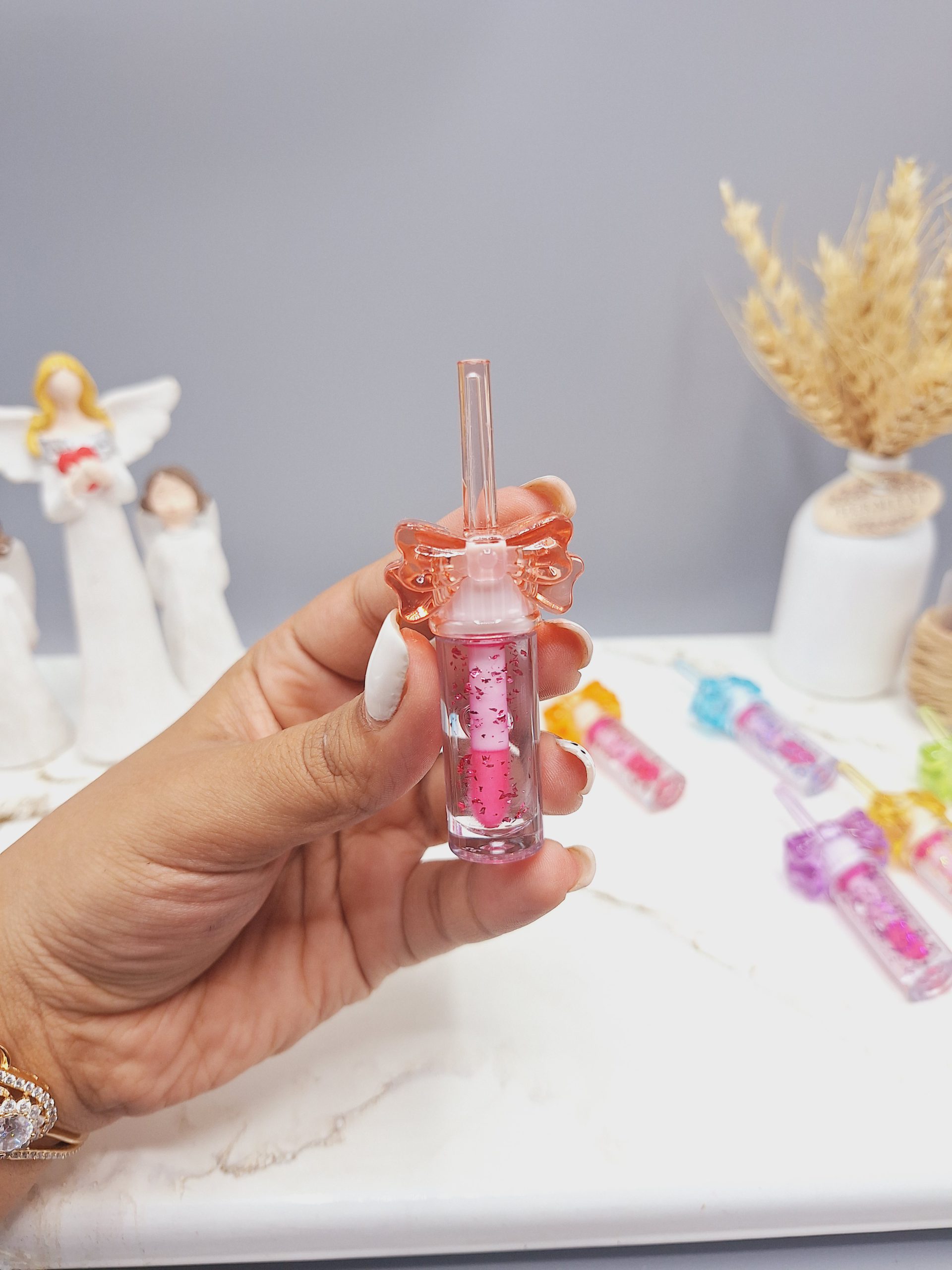 برق لب شاین دار زیبا طرح پاپیون برند Romantic lady برند NO:JY8055