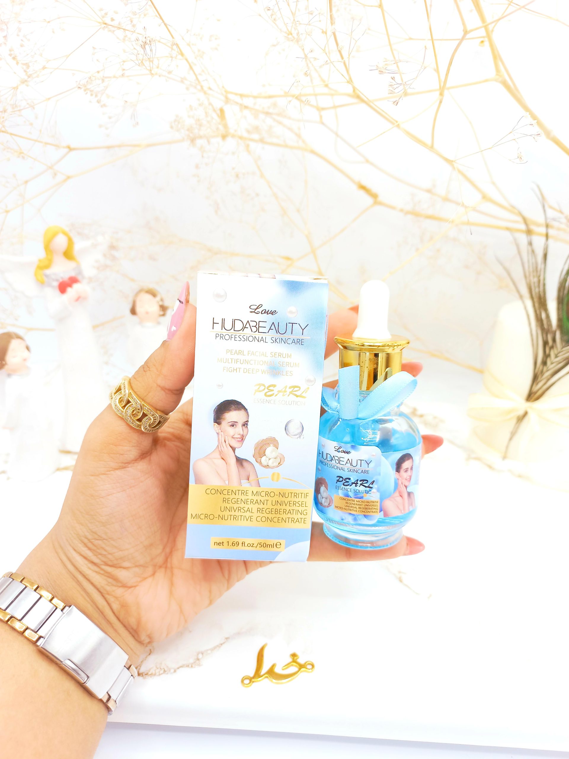 سرم و پرایمر مغذی جوان کننده صورت مروارید هدی بیوتی HUDABEAUTY کد HD826009