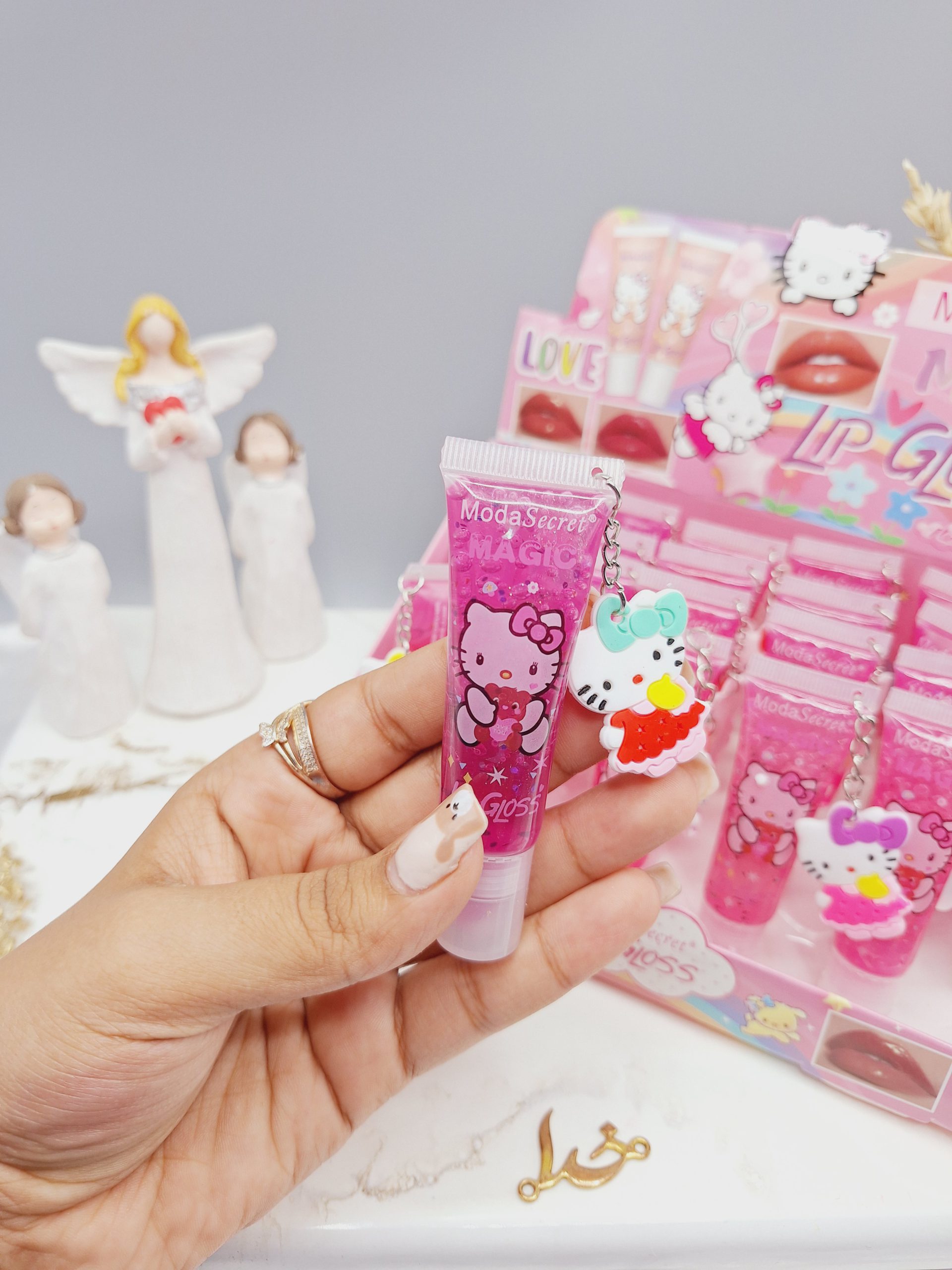 لیپ گلاس گیلیتری آویز دار طرح کیتی کد YL_0018