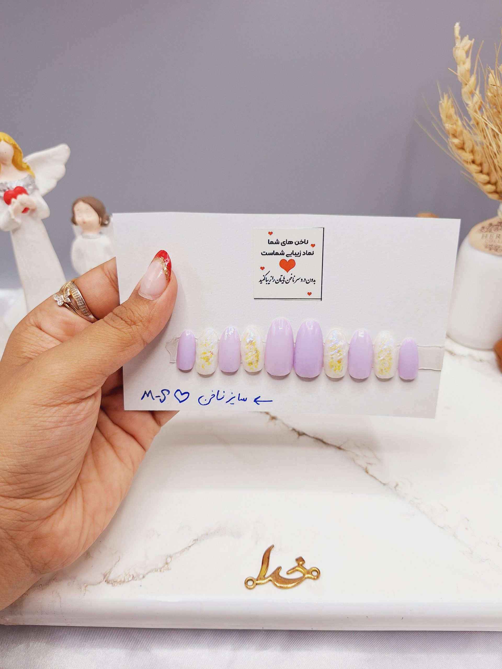 ناخن مصنوعی با مواد کاشت درجه 1 رنگ سفید و یاسی مدل طرح دار