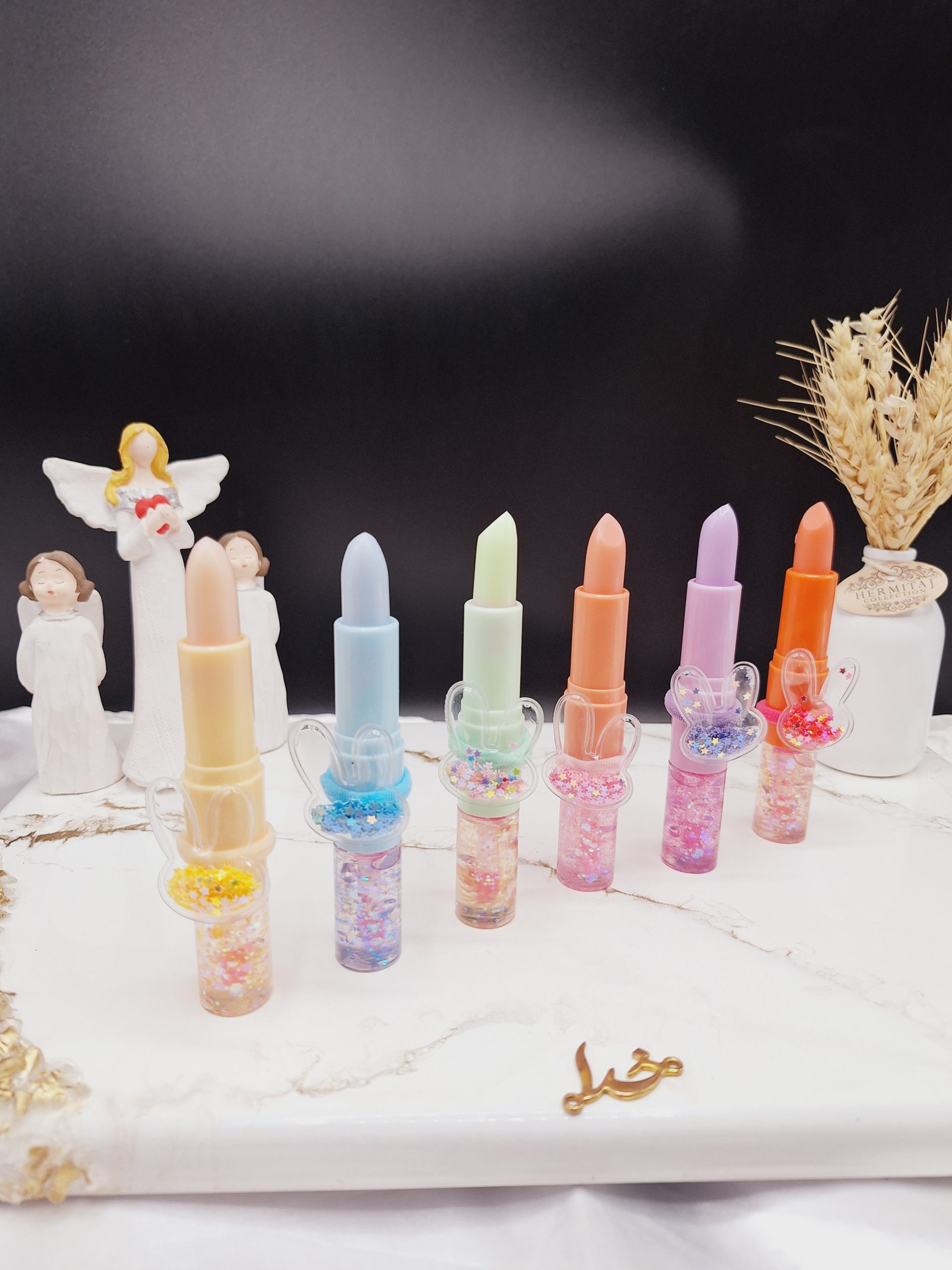 لیپ گلاس و بالم لب همراه با کش مو فانتزی موکالره Mocallure کد Moc 319