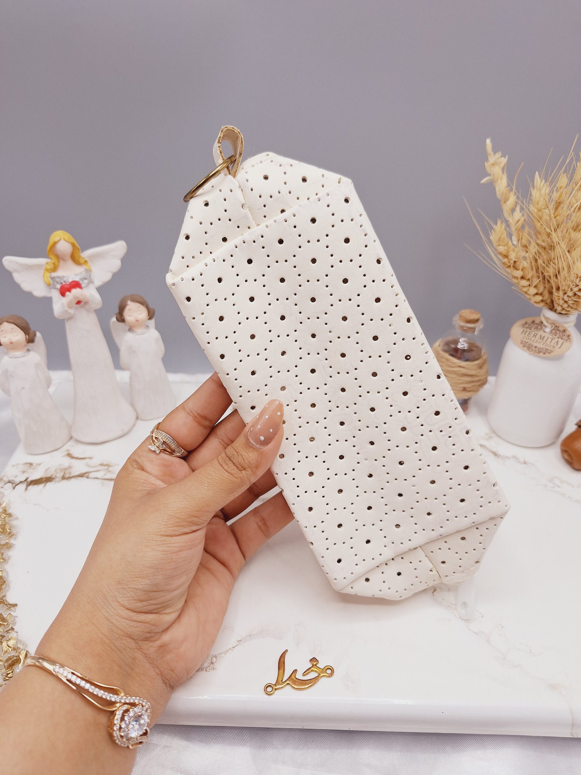 کیف چرمی لوازم آرایشی طرح هویه