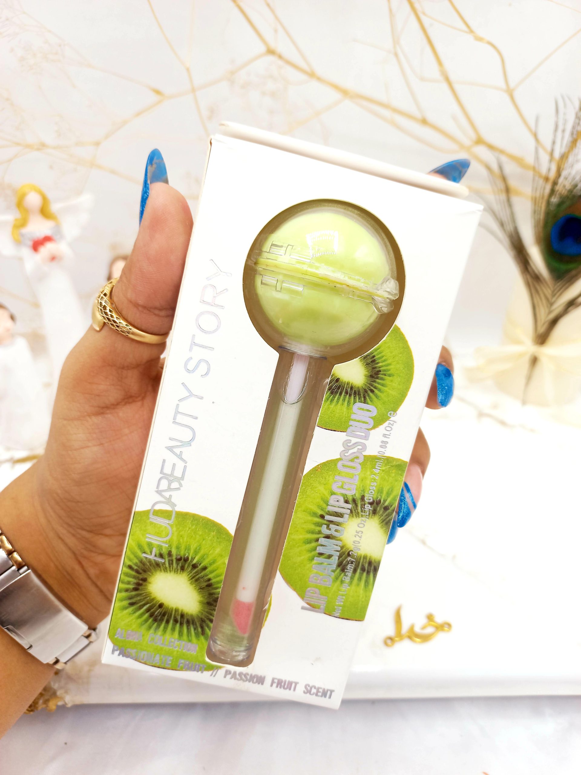 برق لب و بالم لب آبنباتی کیوی هدا بیوتی استوری HUDA BEAUTY STORY