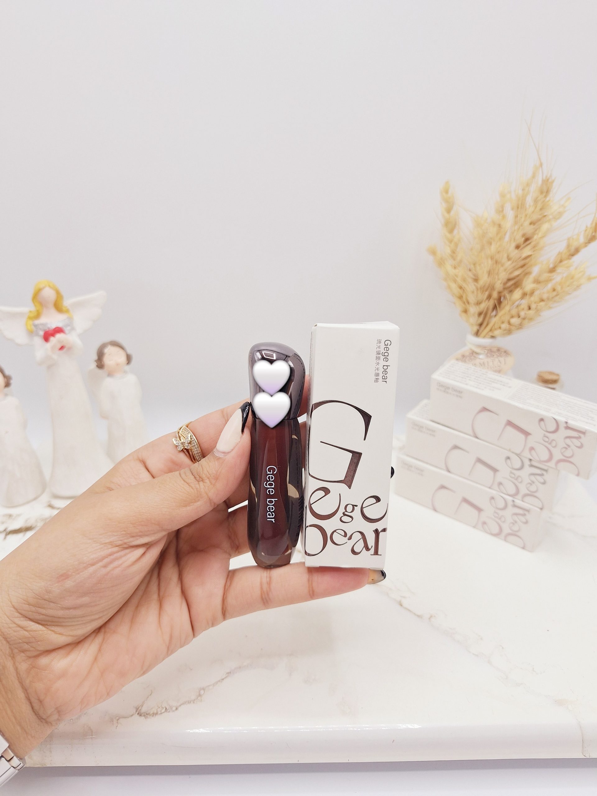 لیپ گلاس خیس پرطرفدار برند Gege beae کد 2325 (کارتن سفید و نارنجی)