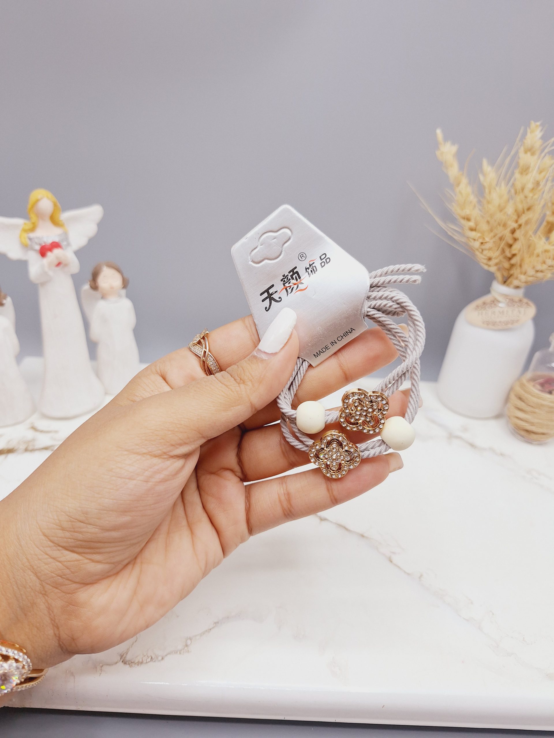 کش مو 2 تایی طرح گل نگین دار کد 0022 رندم