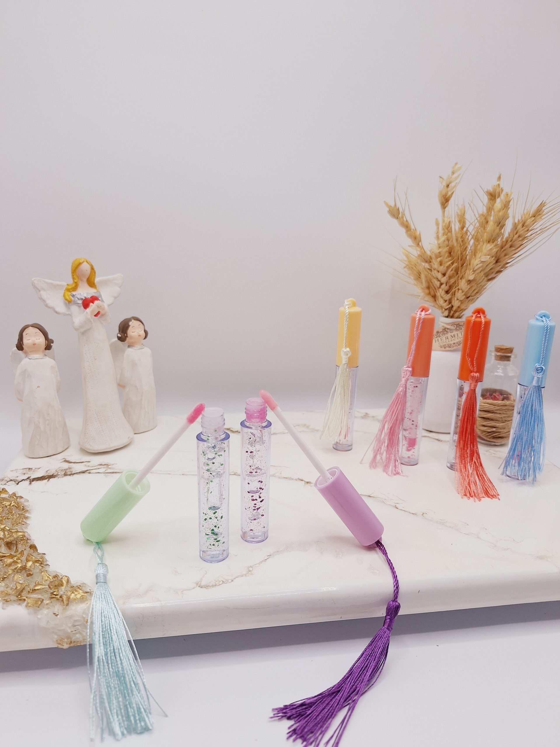 لیپ گلاس فانتزی طرح آویز نخی برند مجیک کد 1273